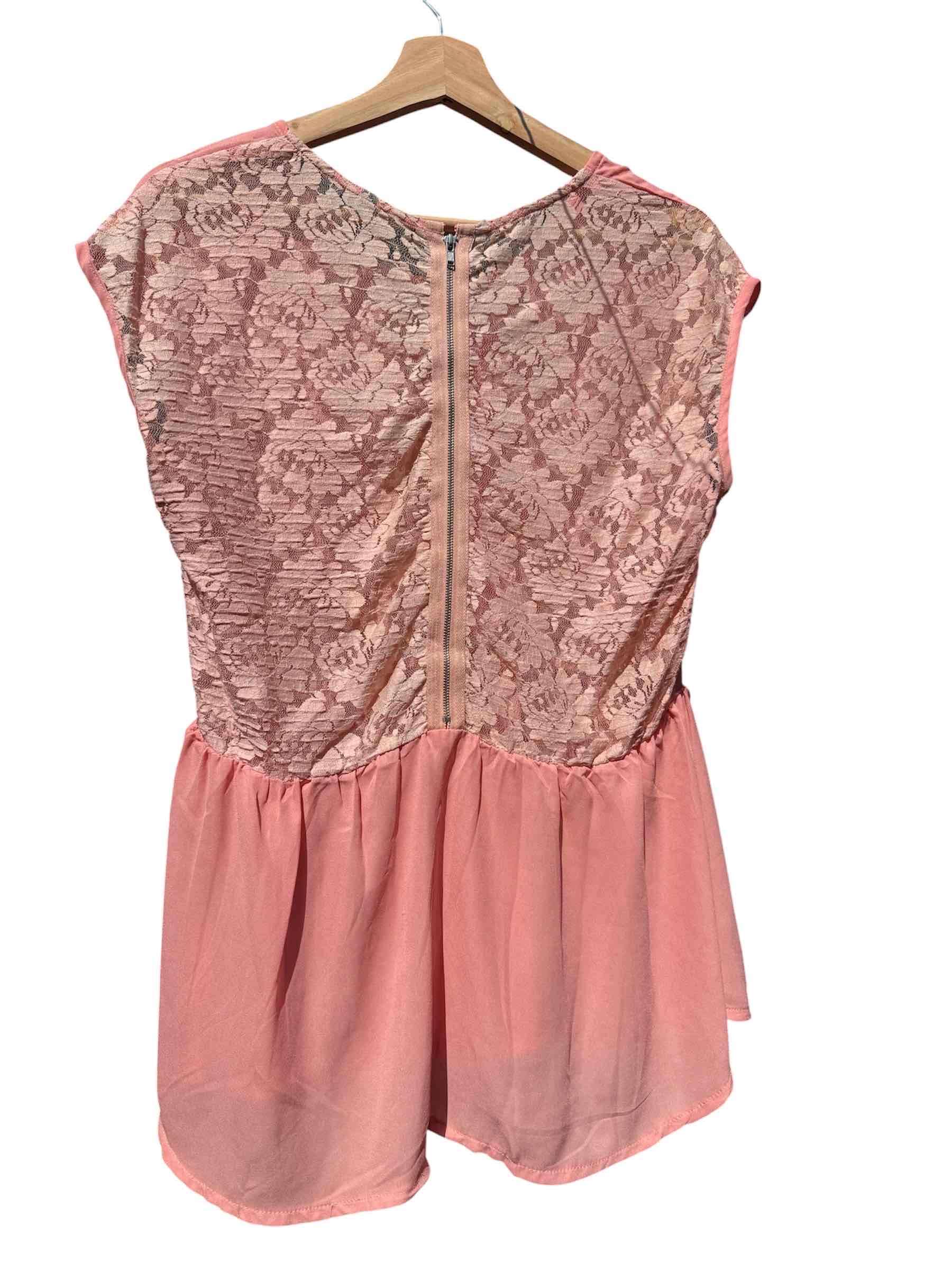 Blusa rosada suelta - miniatura 2