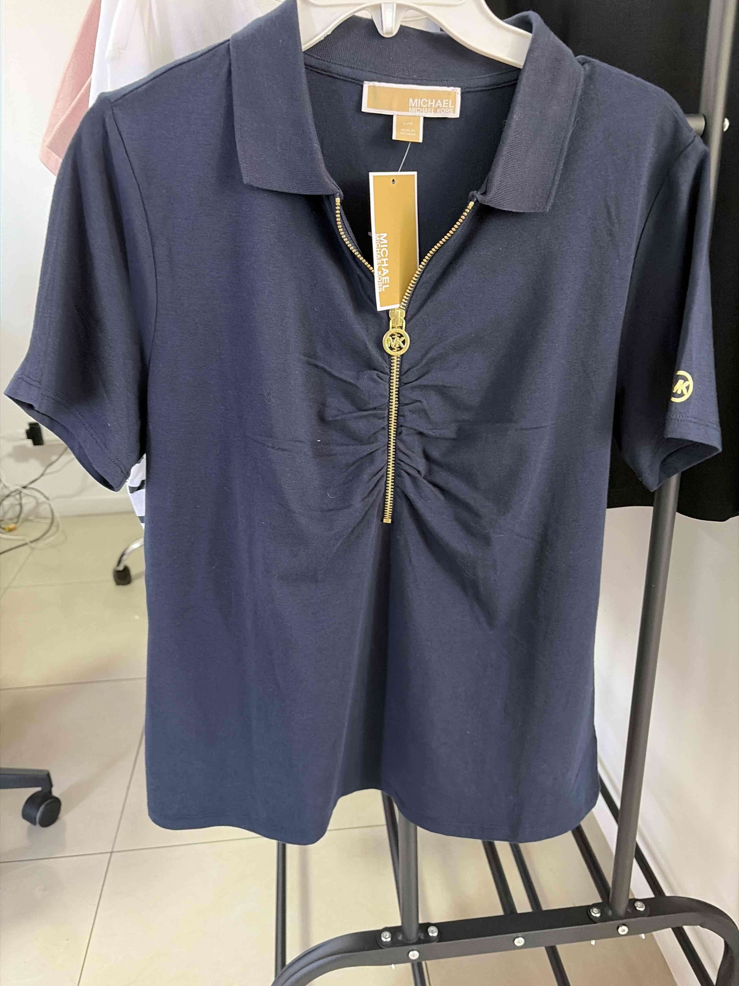 Polera azul con cierre - 1