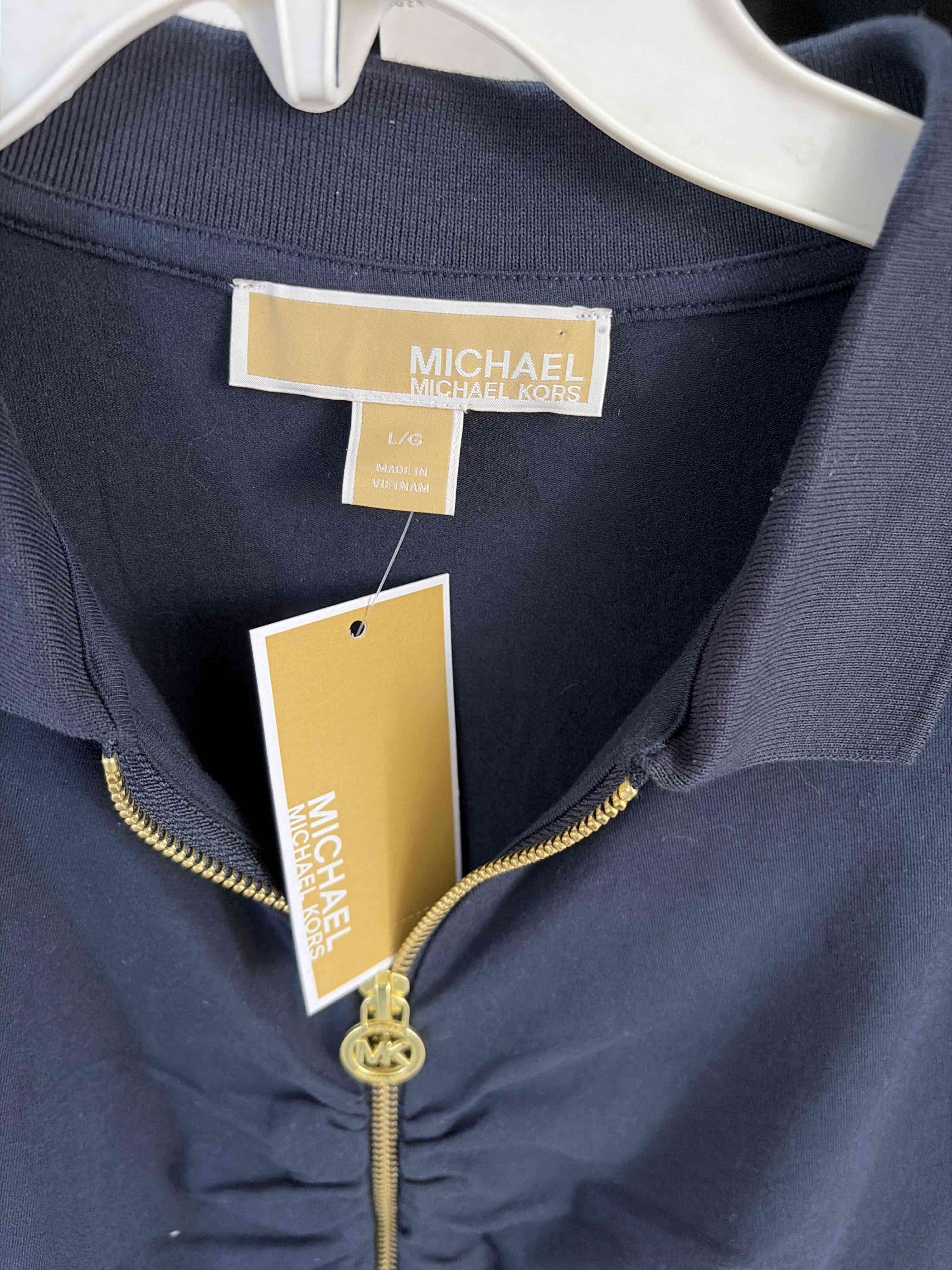 Polera azul con cierre - 2