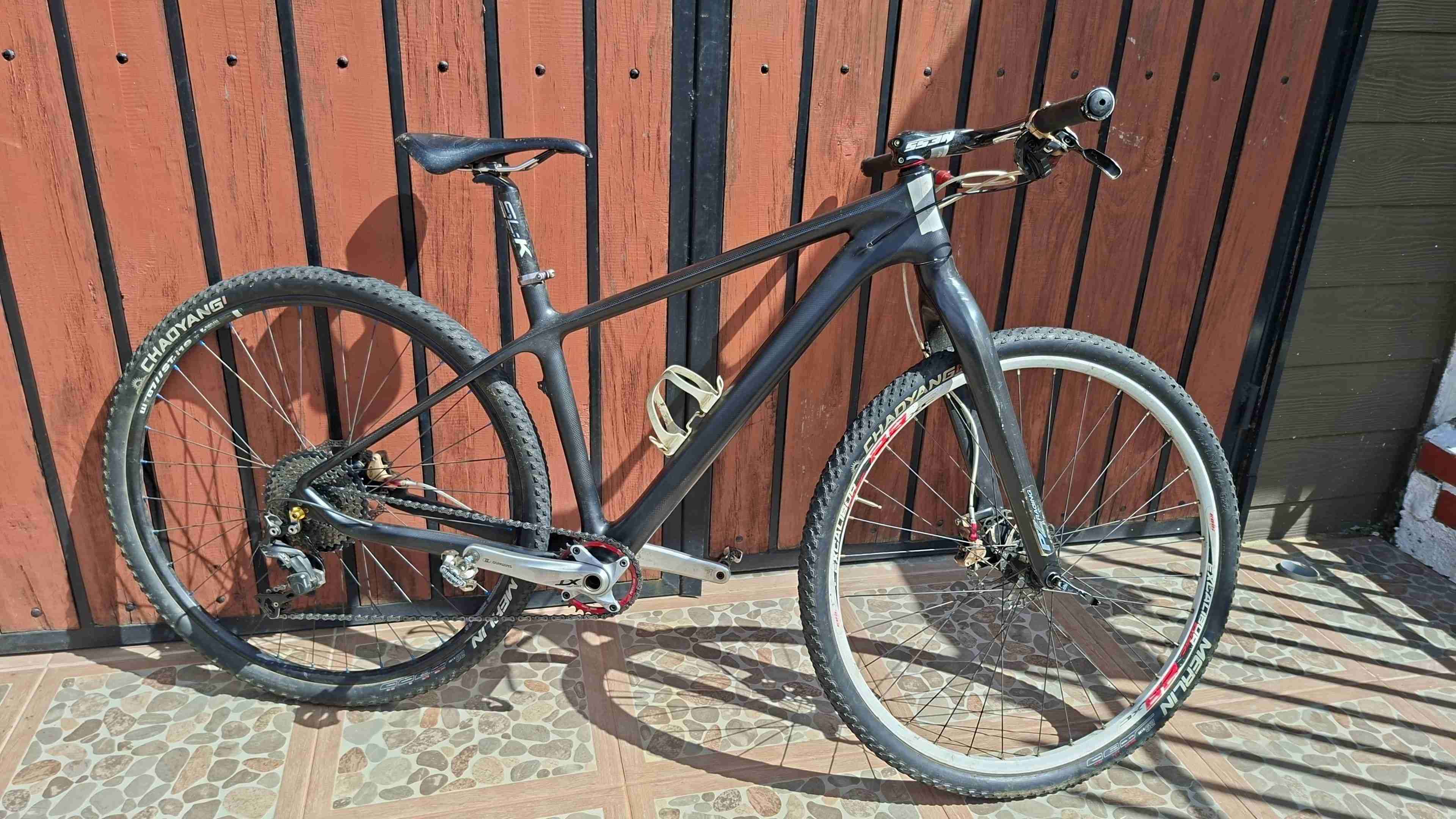 Bicicleta montaña negra carbono 29' talla M - miniatura 1