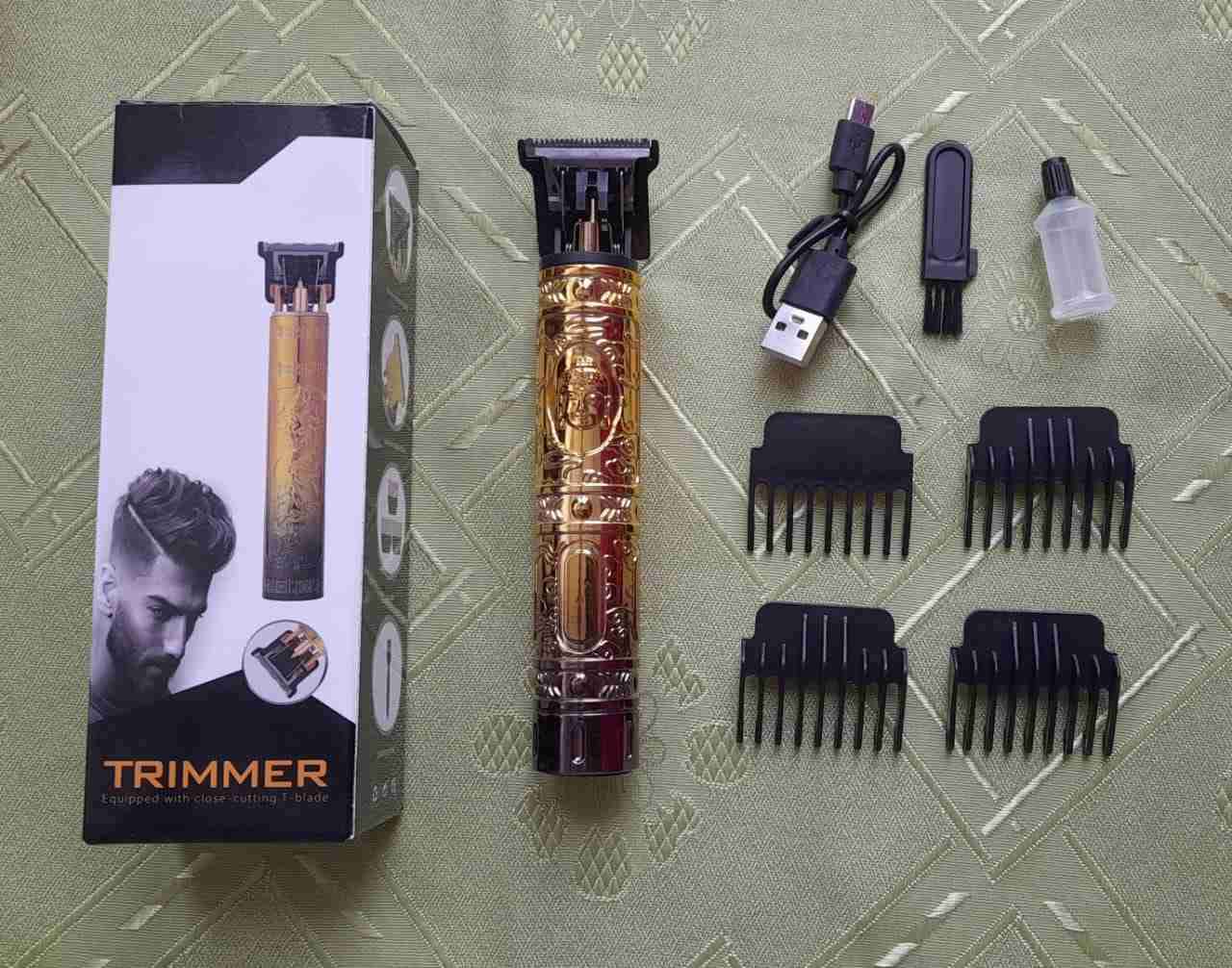 Cortadora de cabello dorada - miniatura 1