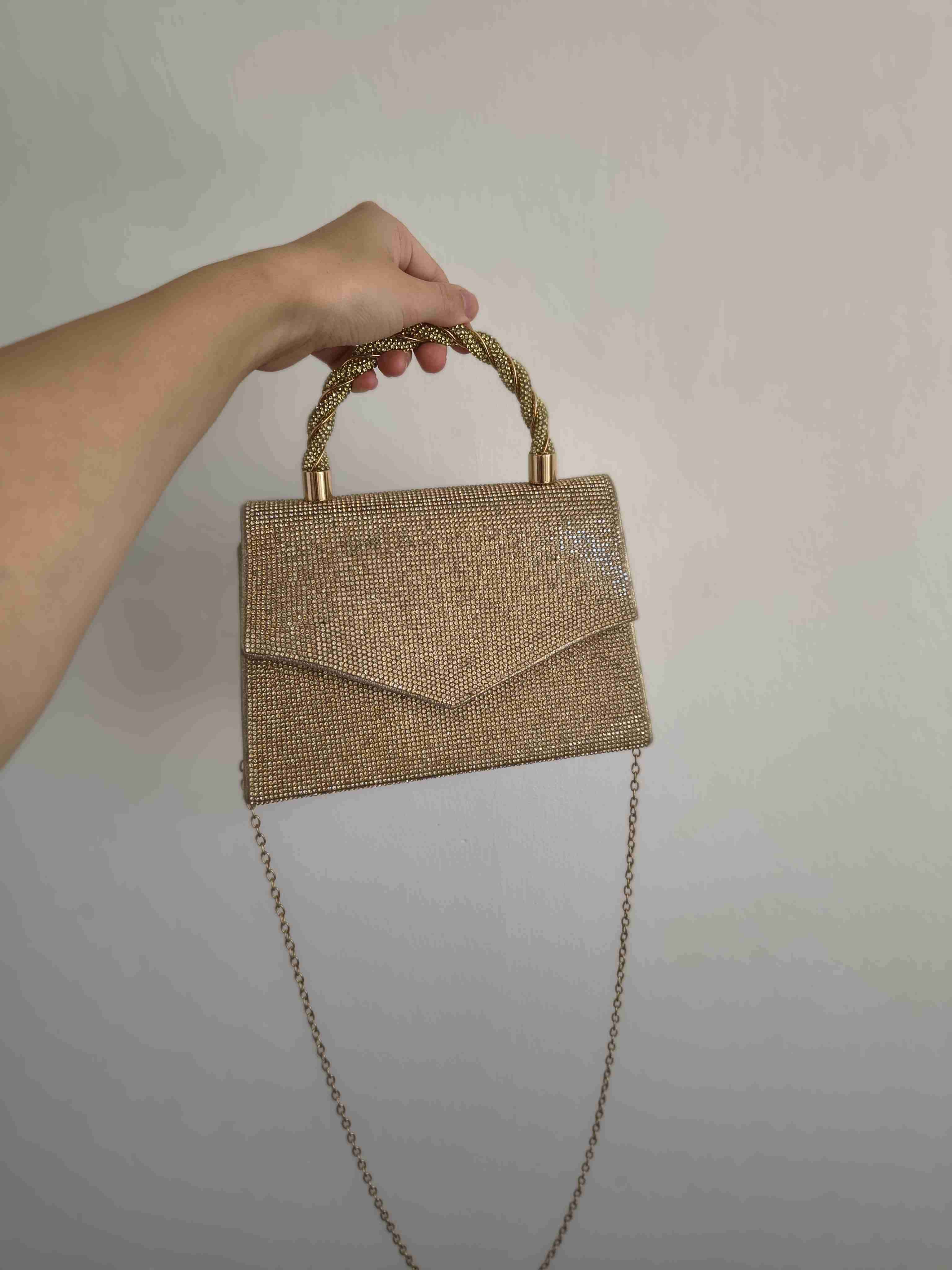 Cartera de mano dorada elegante - 1