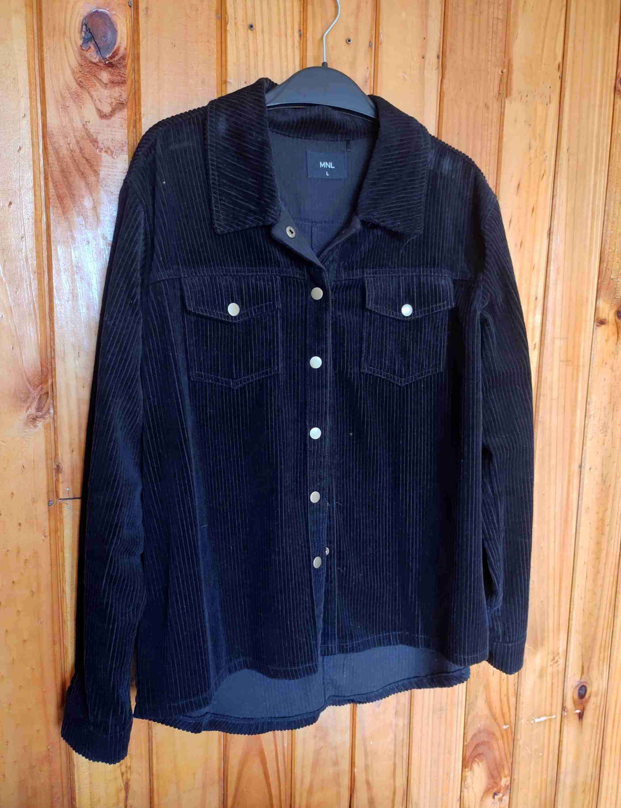 Chaqueta de pana negra