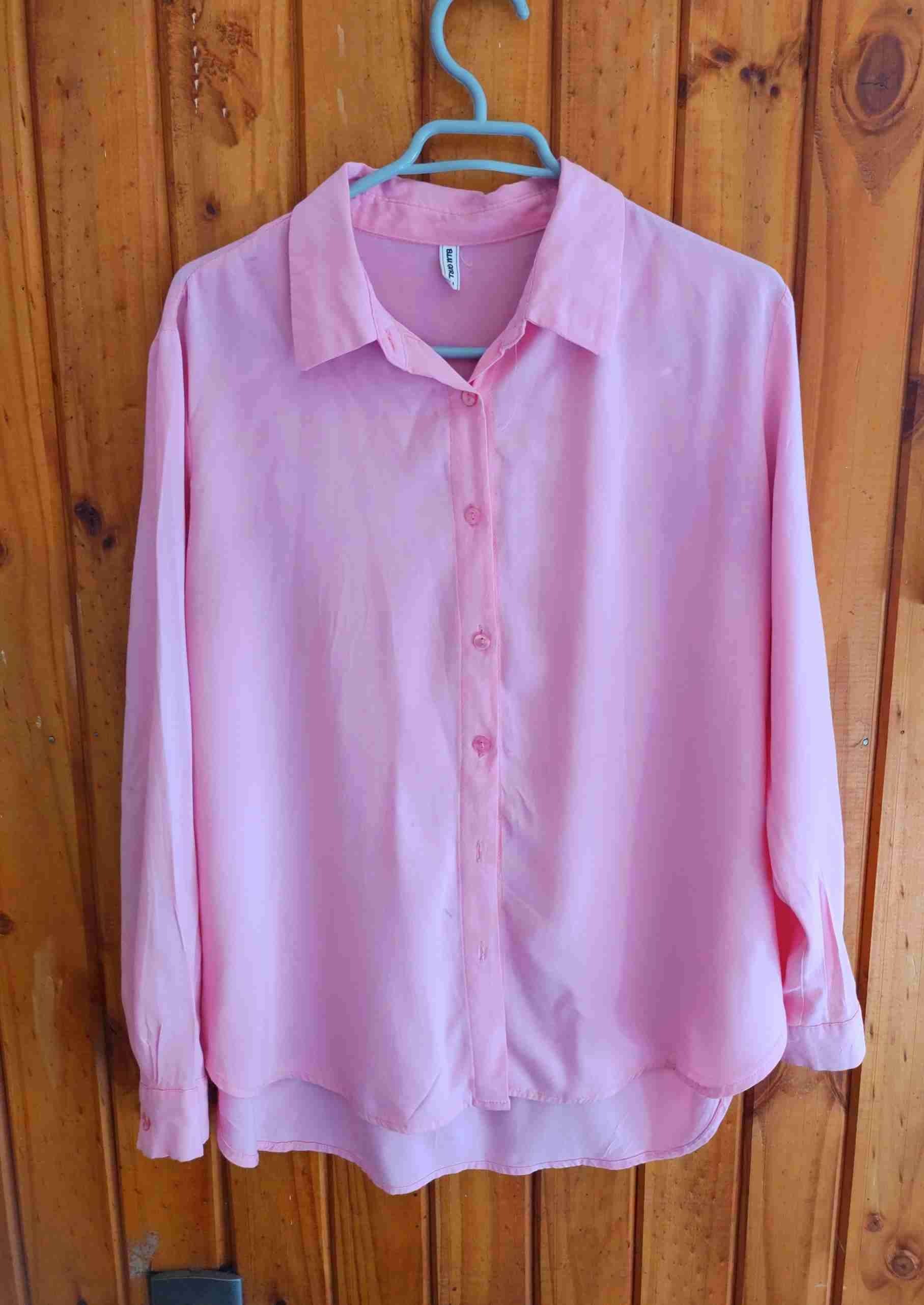 Camisa rosada de mujer