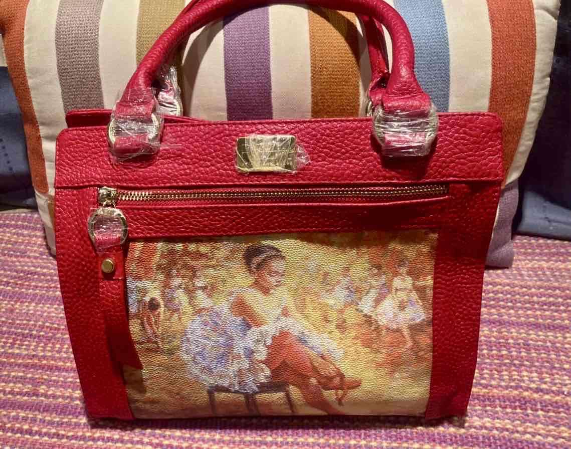 Cartera roja con diseño artístico - miniatura 1
