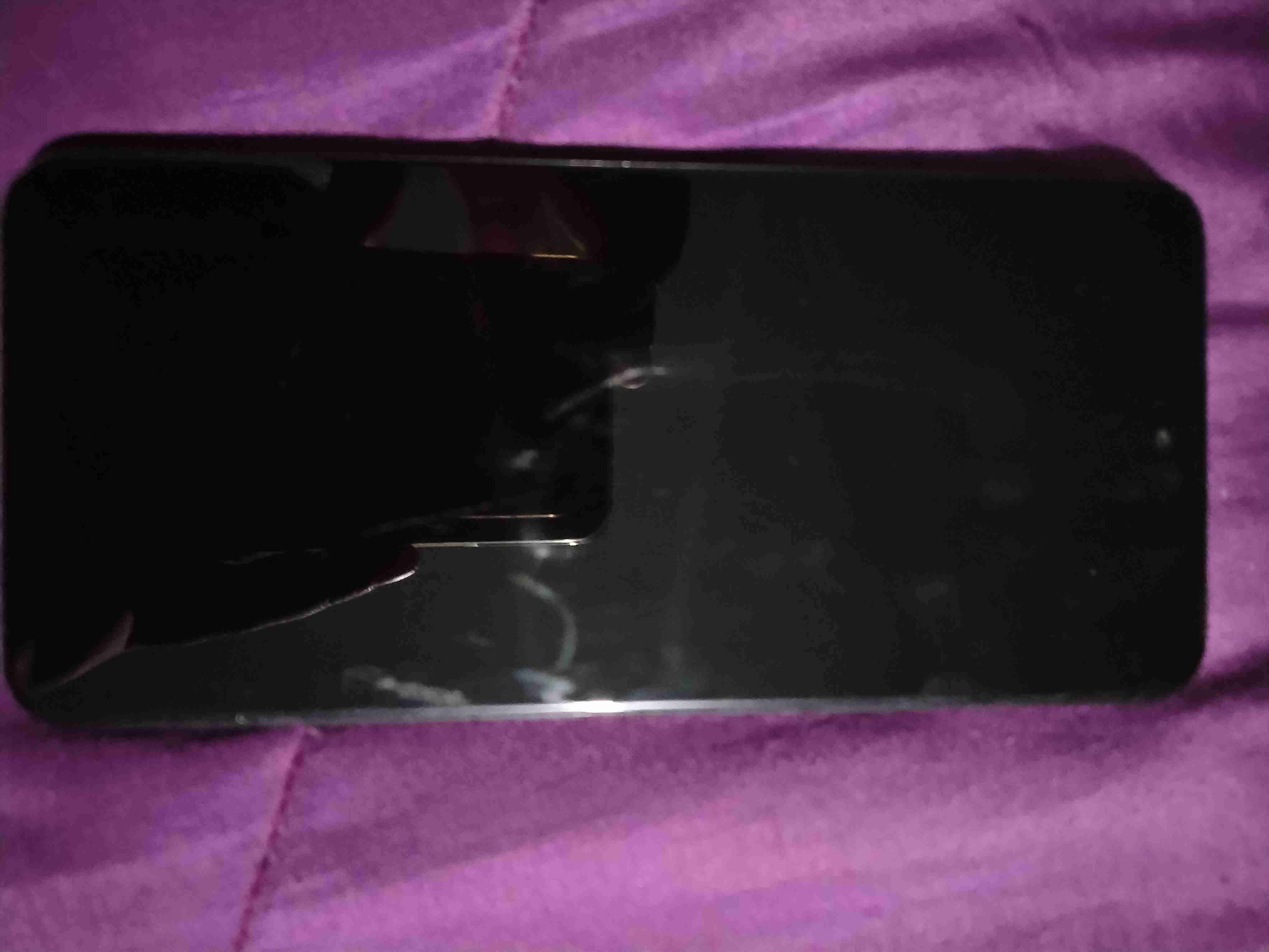 Smartphone negro usado - miniatura 1