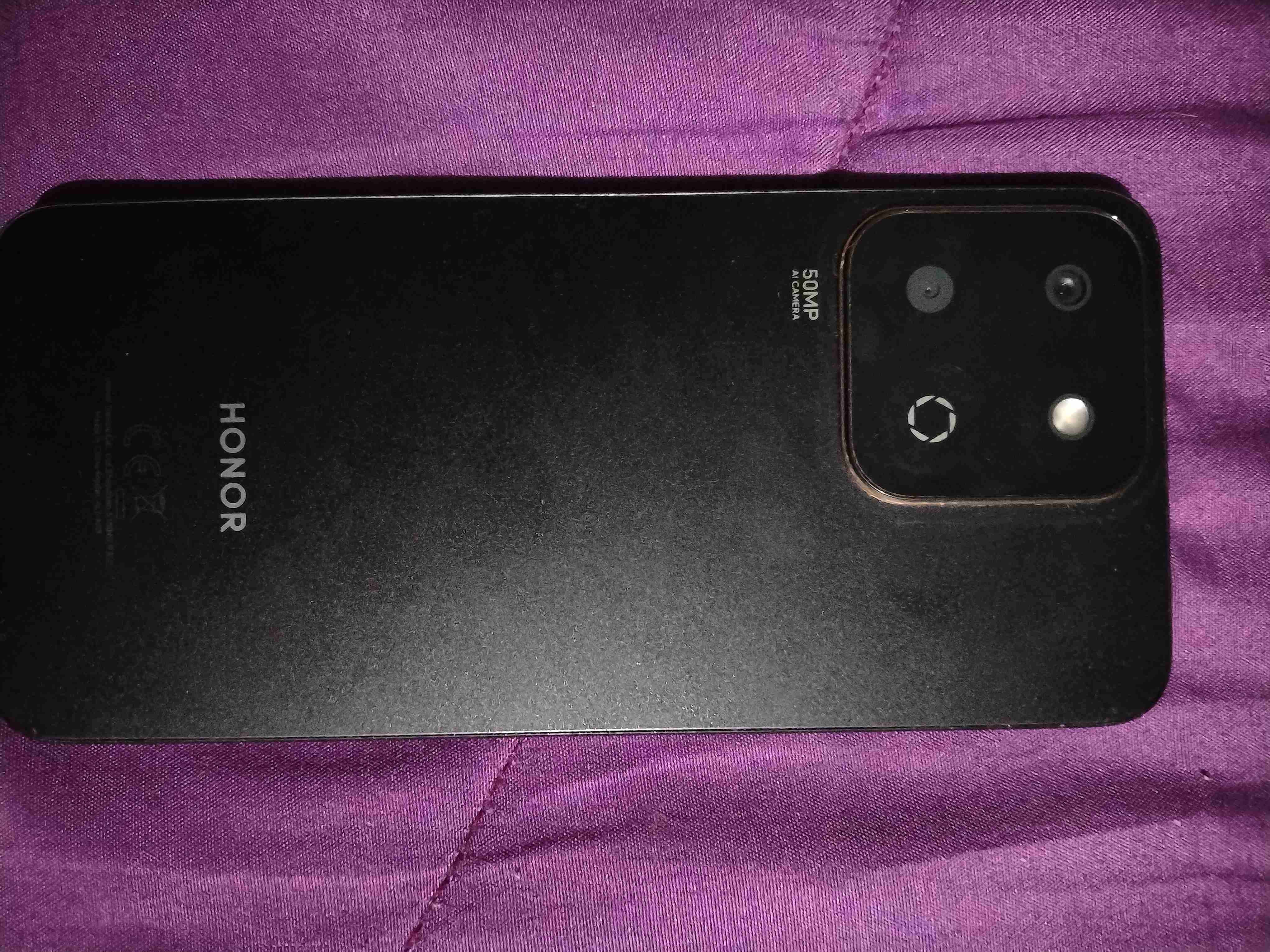 Smartphone negro usado - miniatura 2