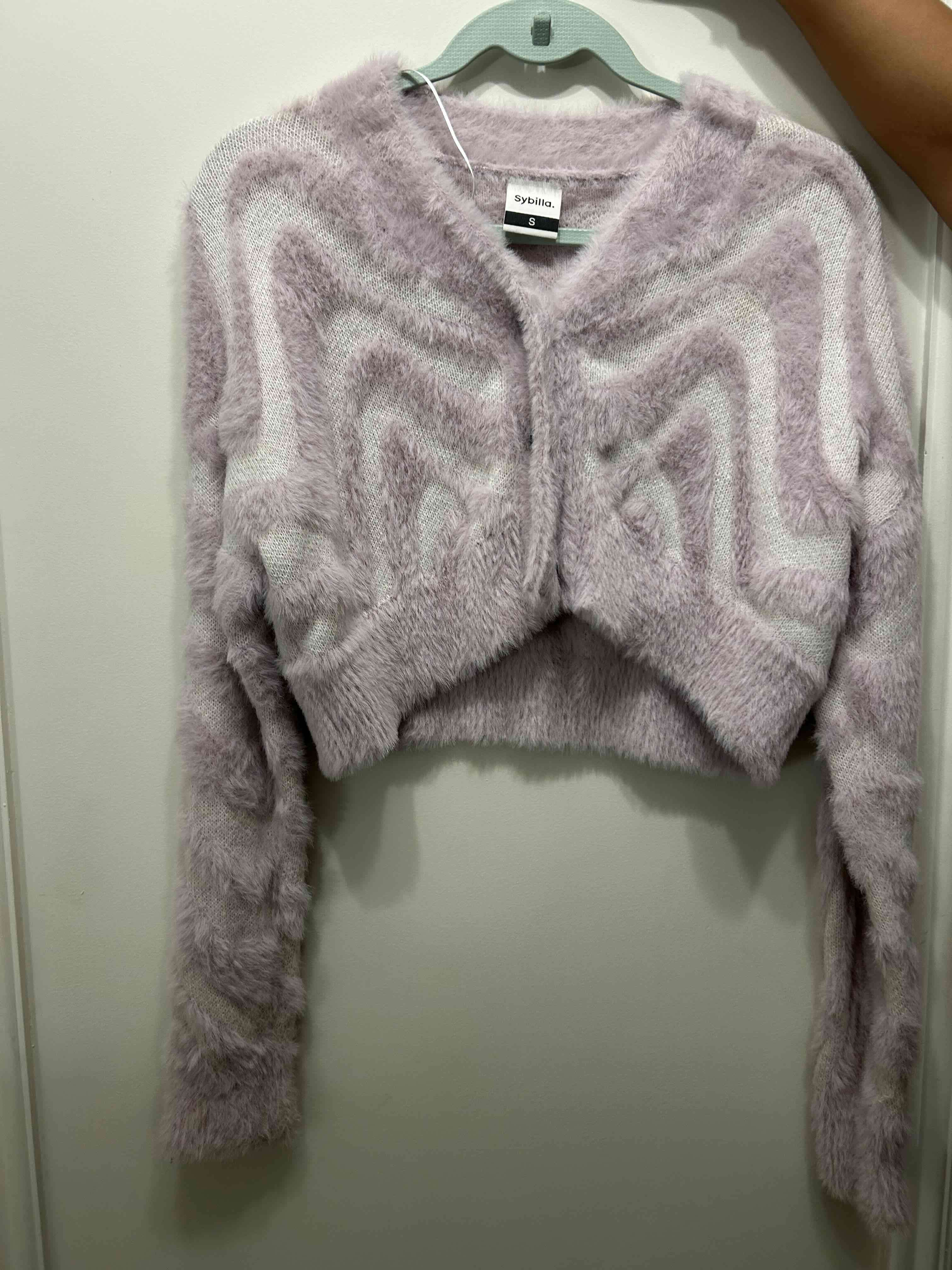 Chaleco peludo lila y blanco