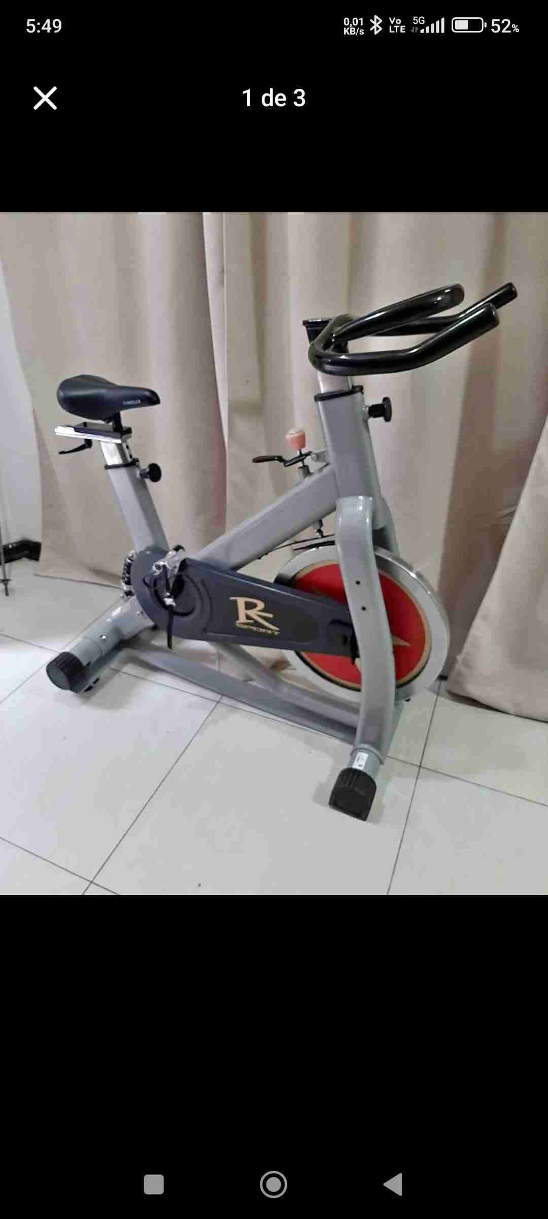 Bicicleta estática spininng de ejercicio gris