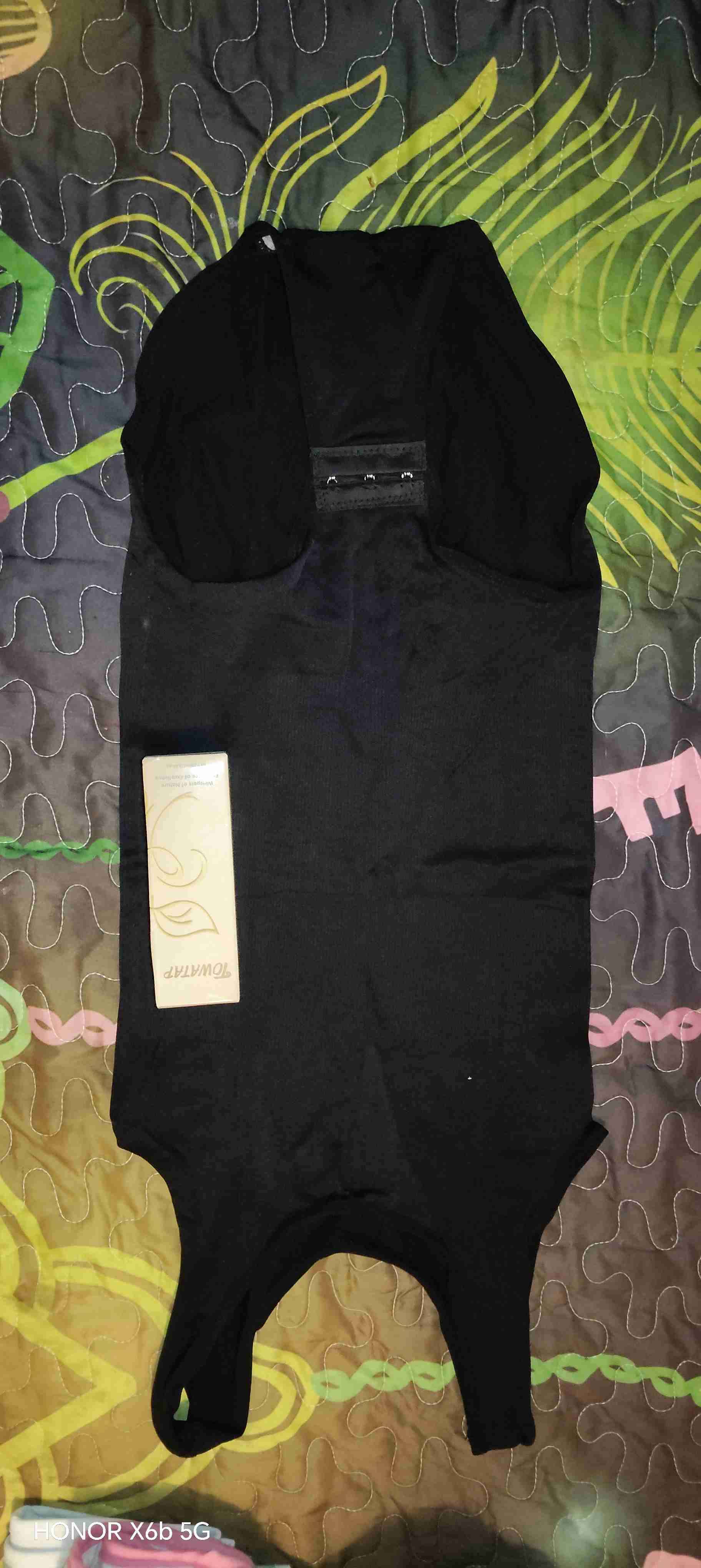 Body negro para mujer y aceite de romero