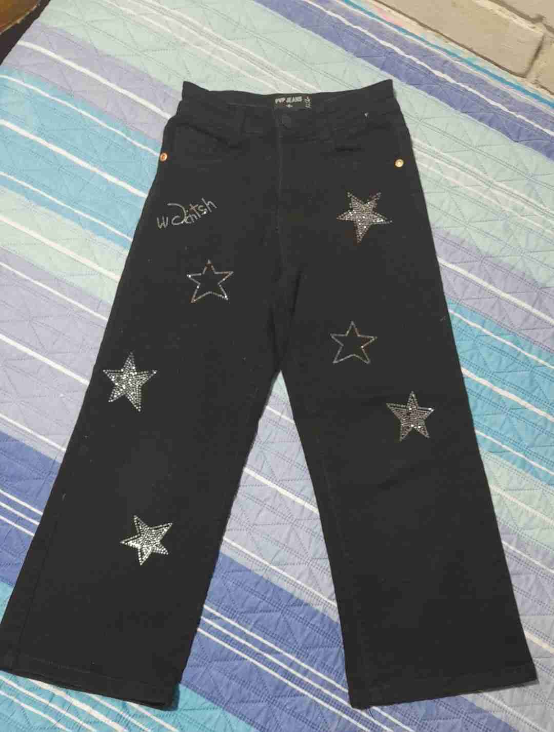 Jeans negros con estrellas brillantes - miniatura 1