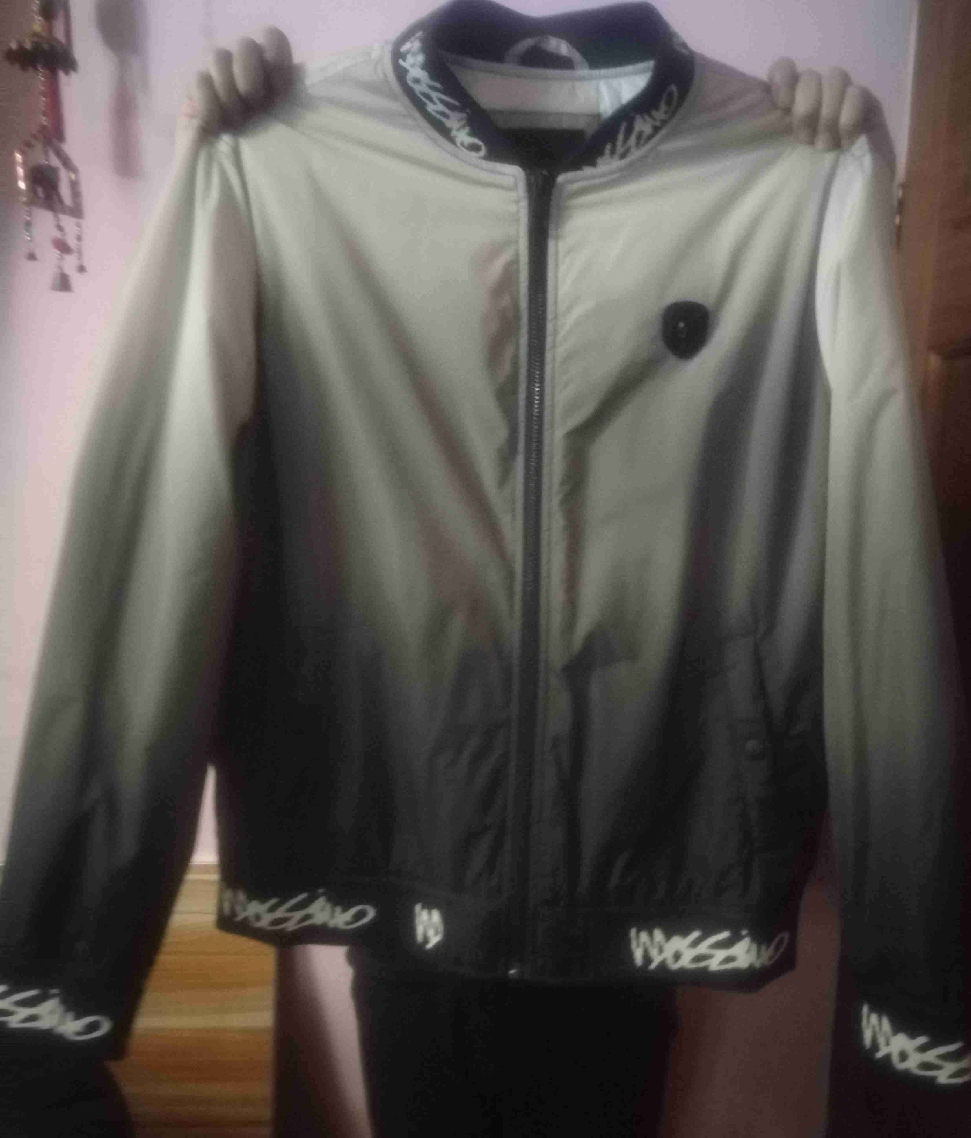 Chaqueta deportiva gris y negra - miniatura 1