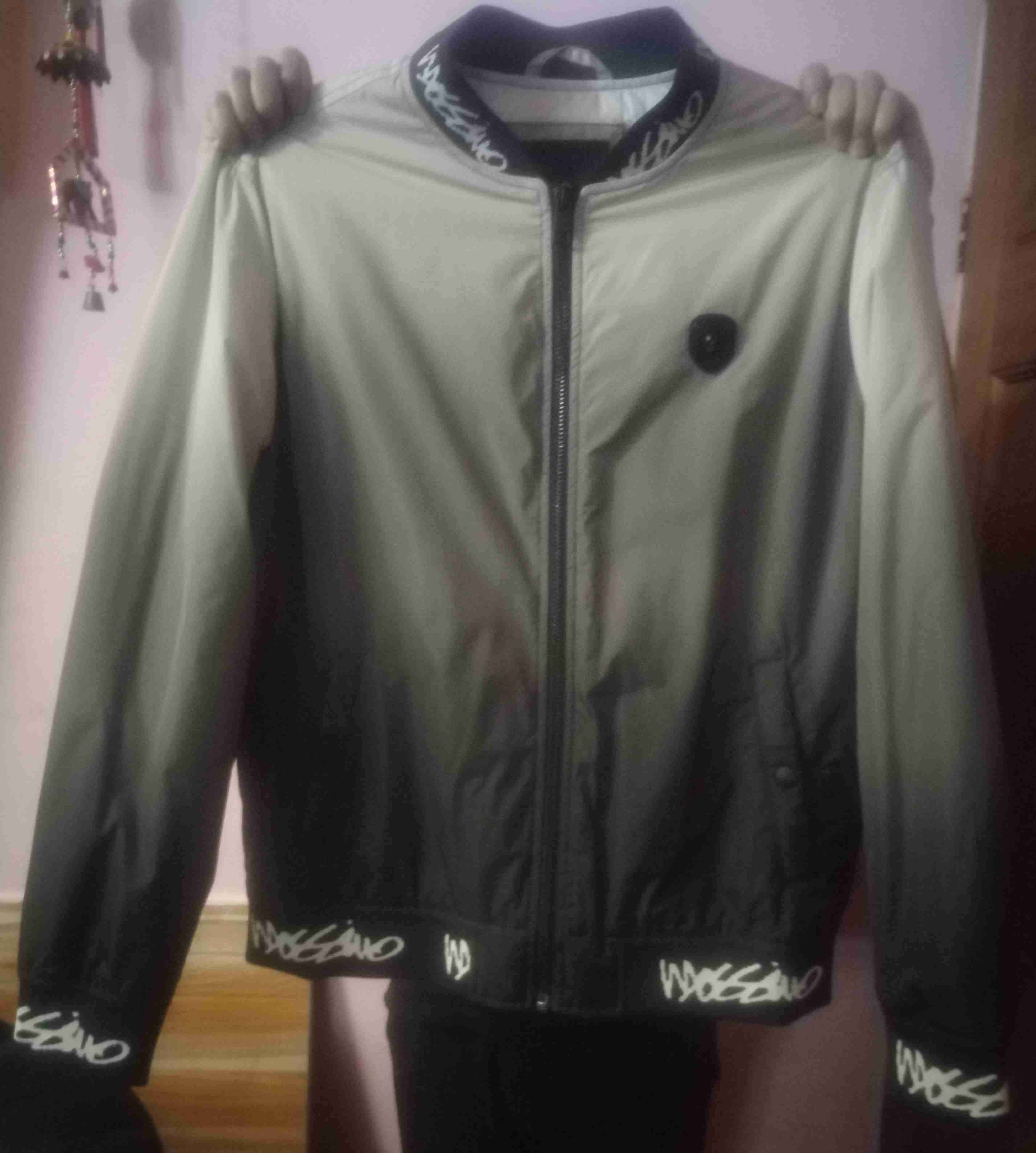 Chaqueta deportiva gris y negra - miniatura 2