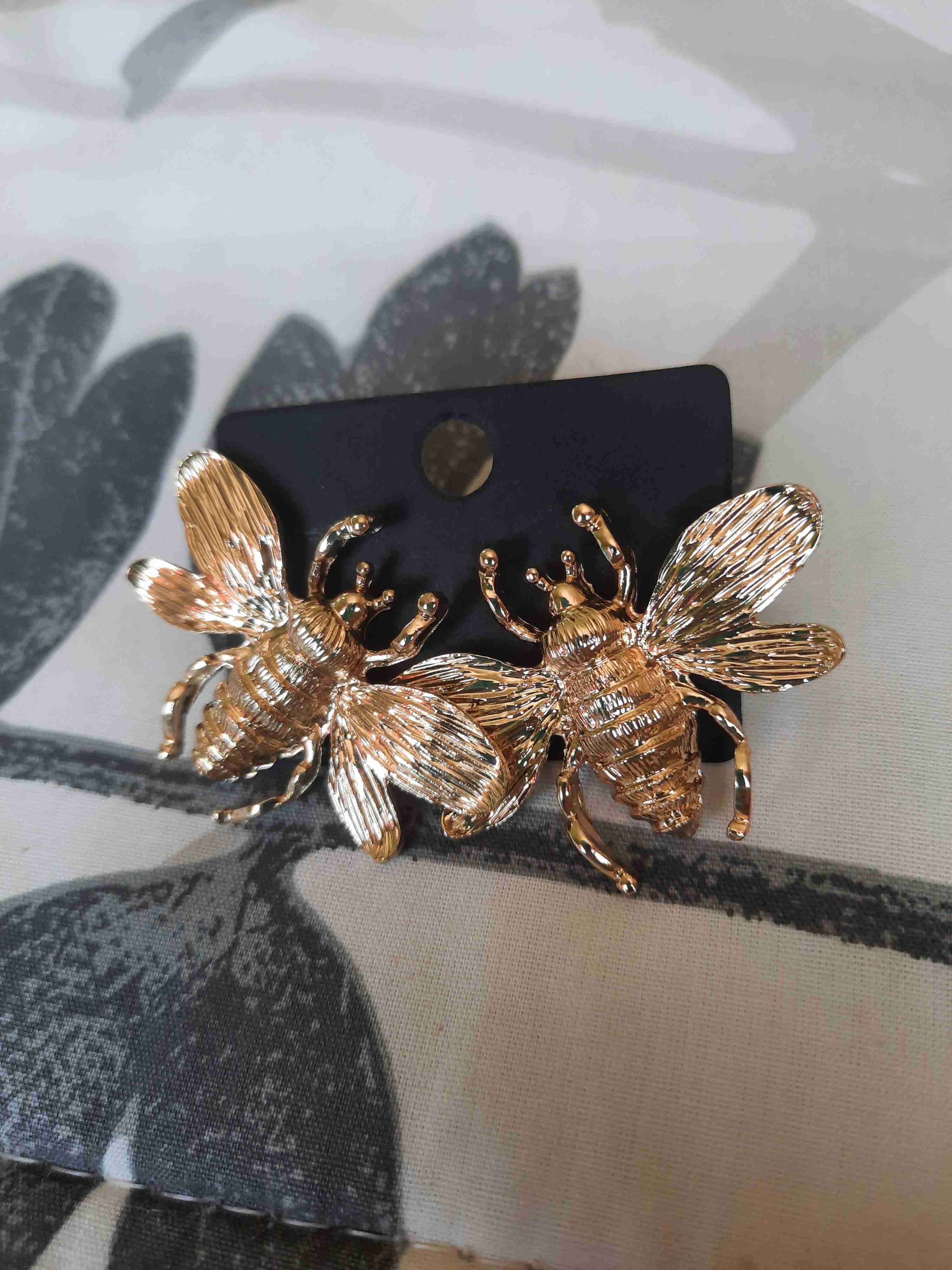 Aros dorados de abejas