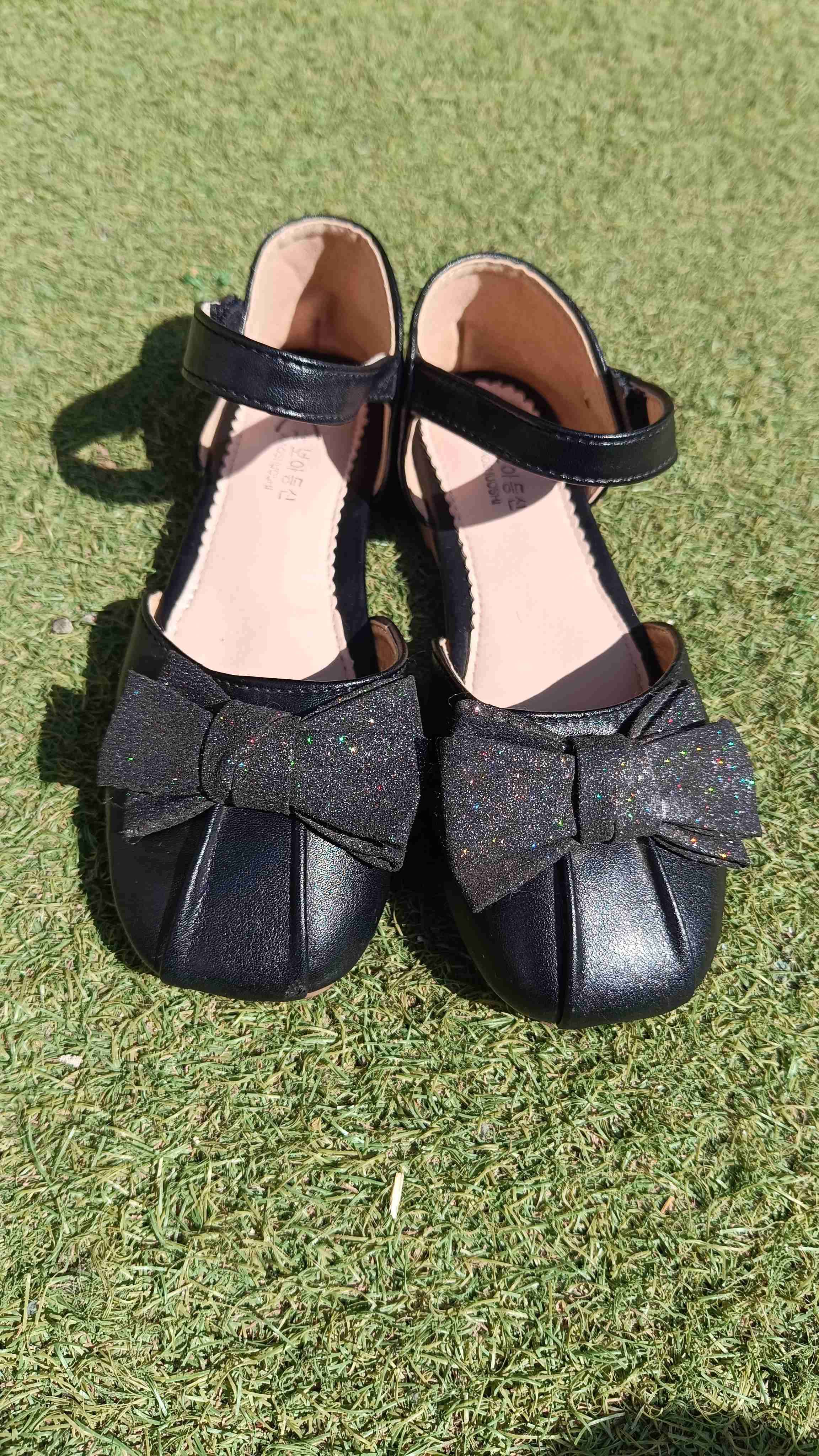 Zapatos negros con lazo de brillo - miniatura 1