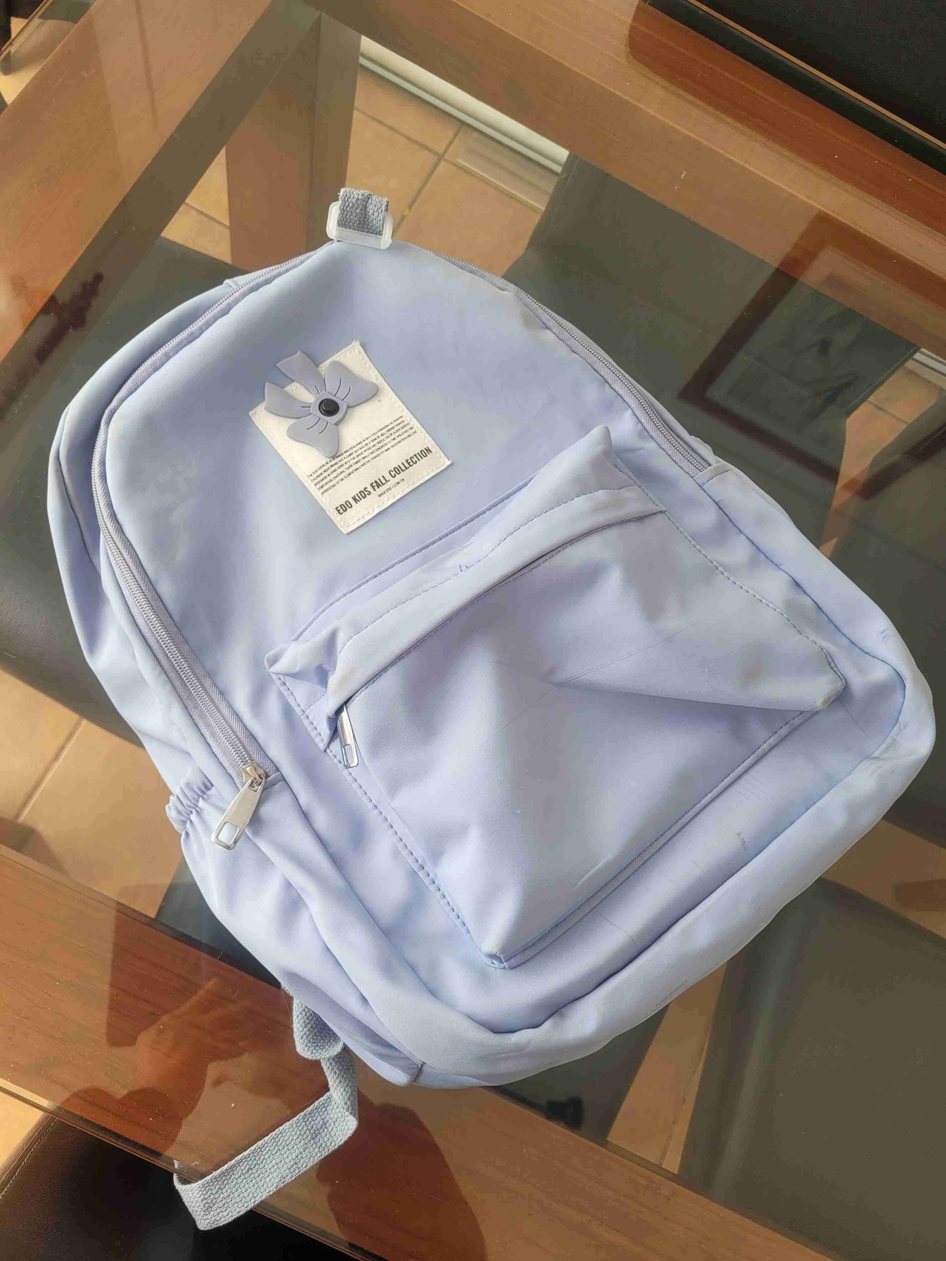 Mochila lila con bolsillo frontal - miniatura 1