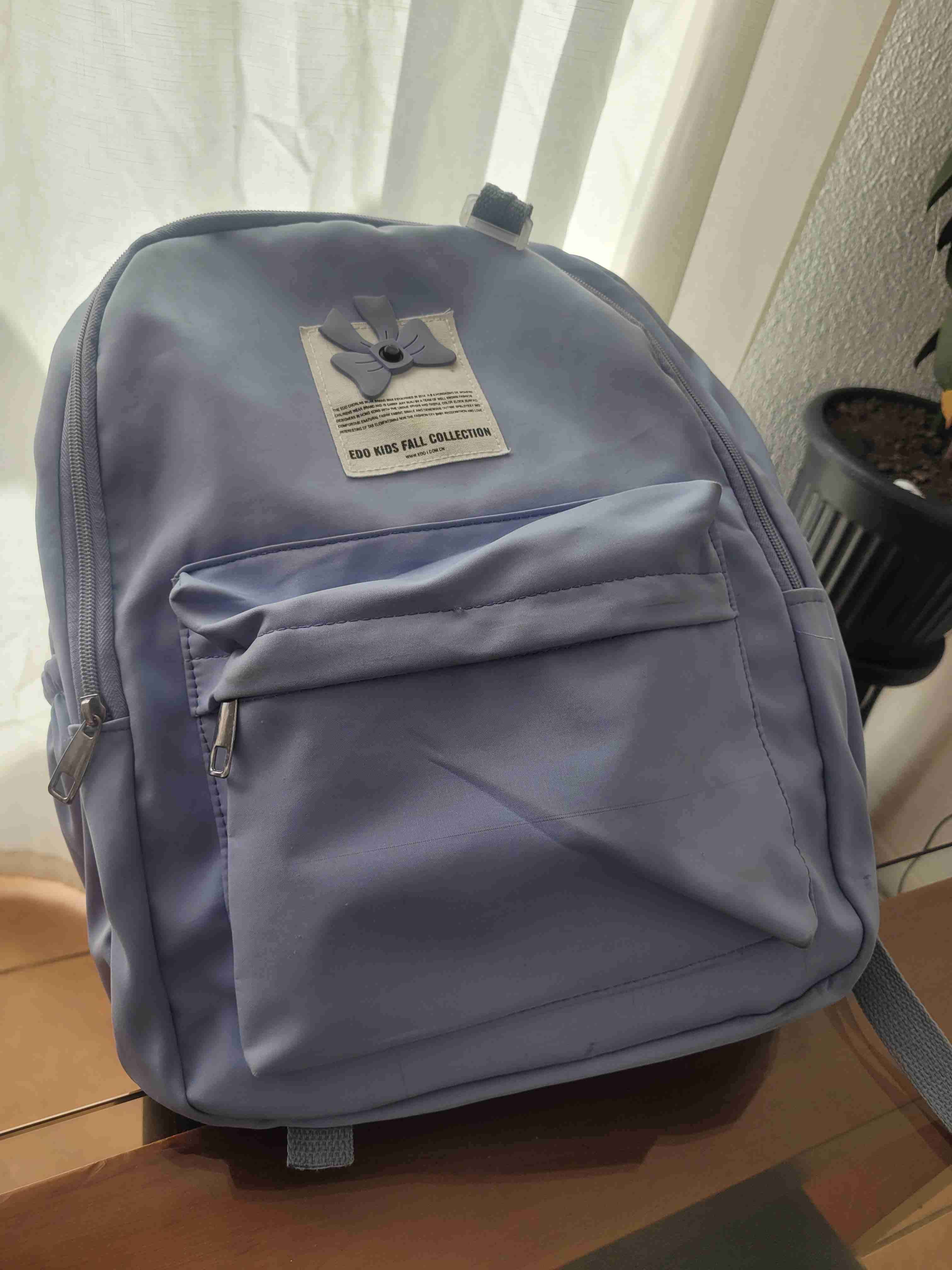 Mochila lila con bolsillo frontal - miniatura 2