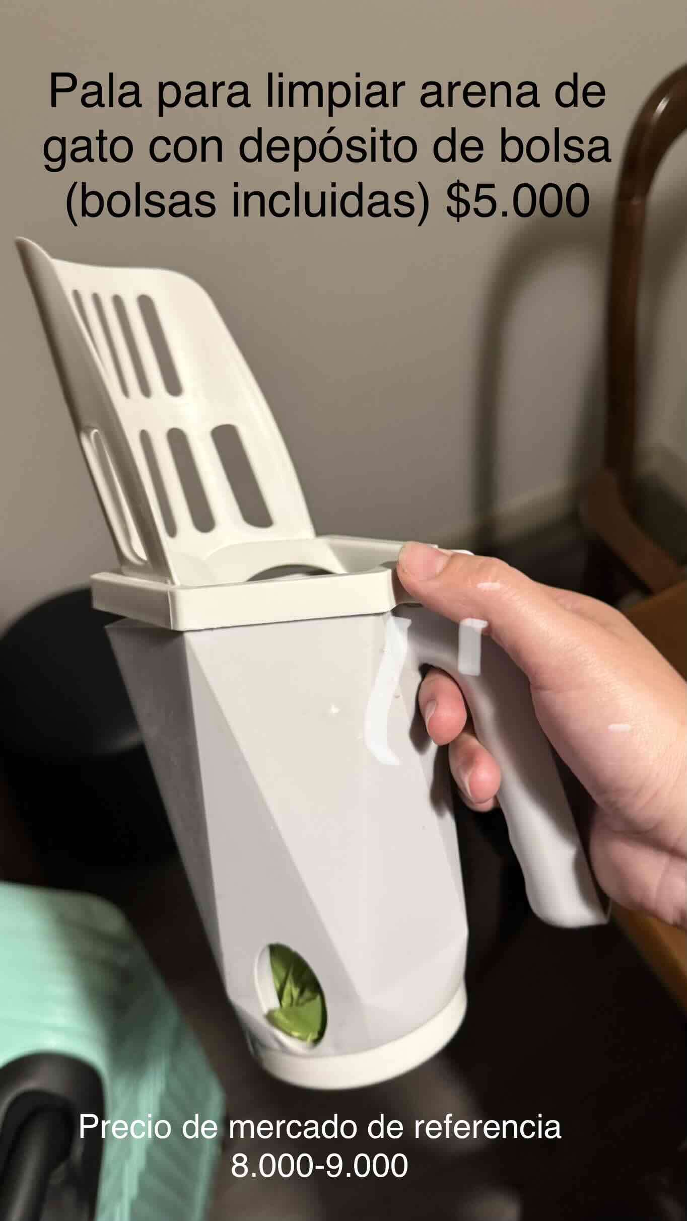 Pala de arena para gato