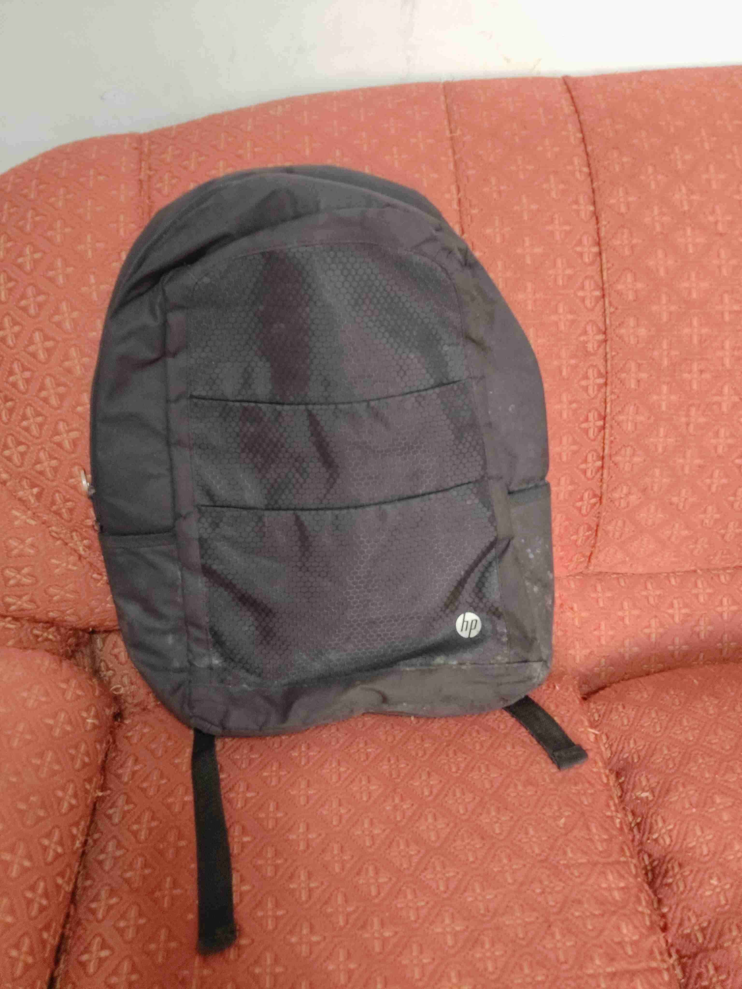 Mochila HP negra usada