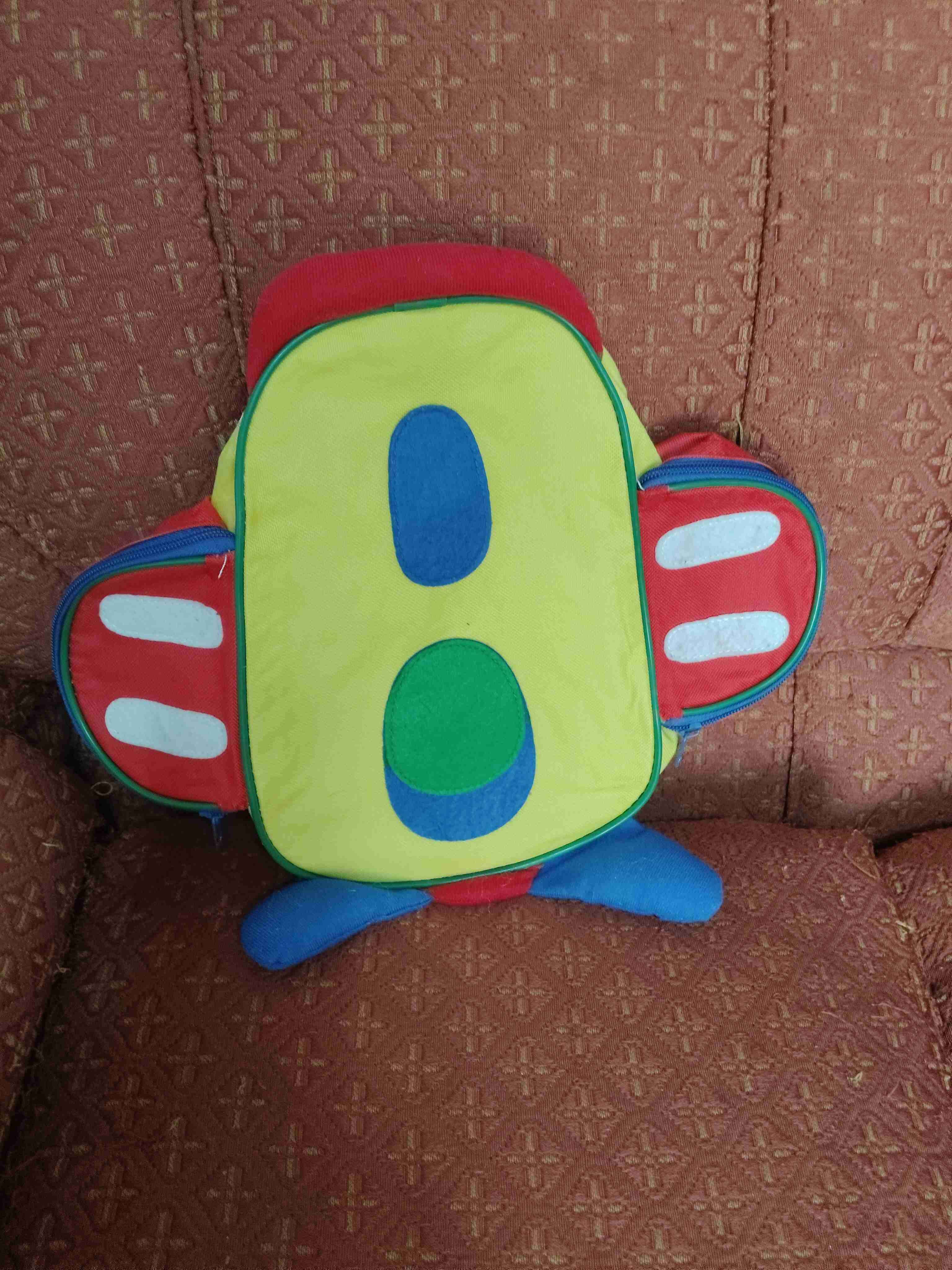 Mochila infantil avión colorida