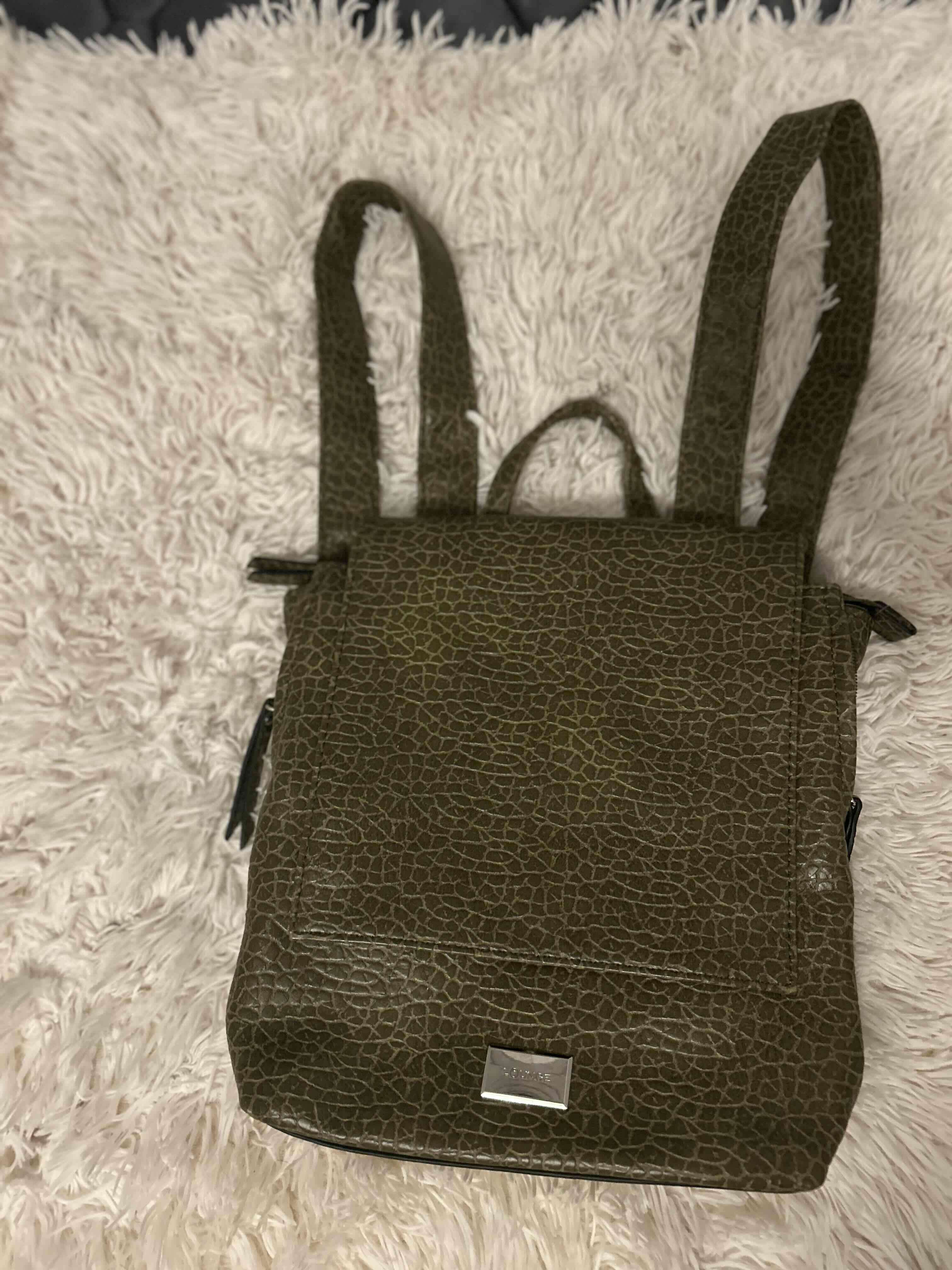 Mochila verde de cuero sintético - miniatura 1