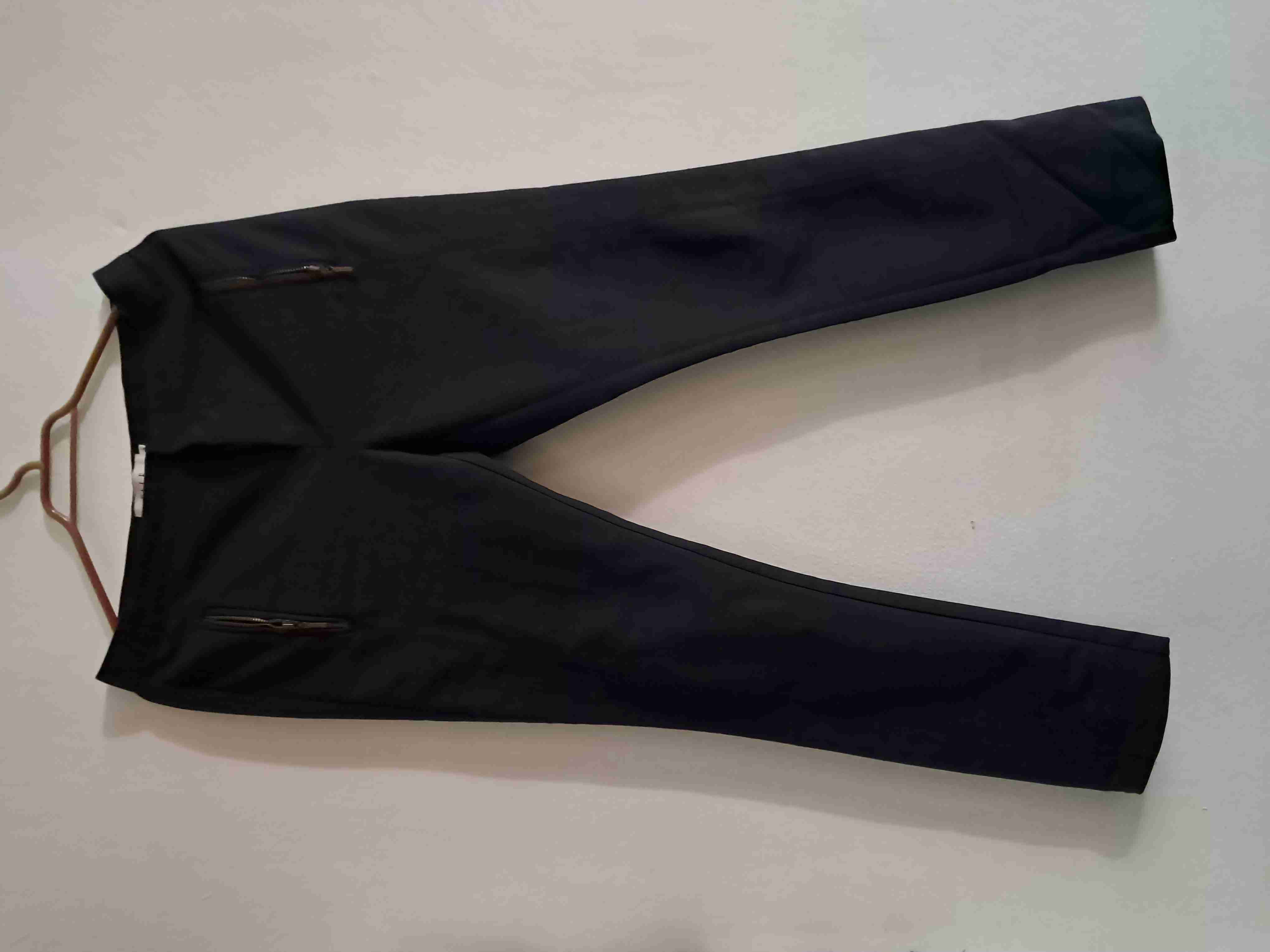 Pantalones negros con bolsillos - miniatura 1