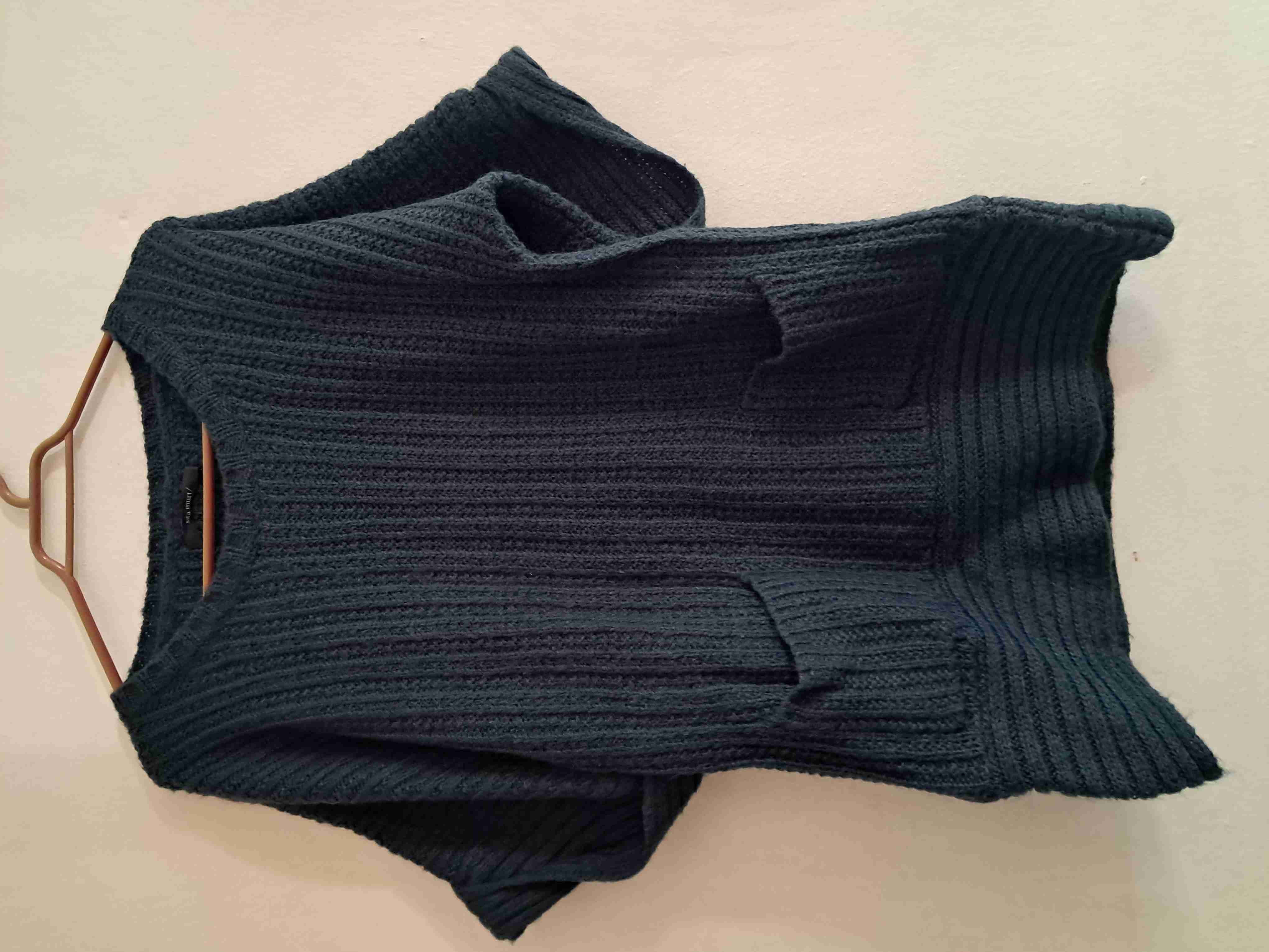 Suéter tejido con bolsillos