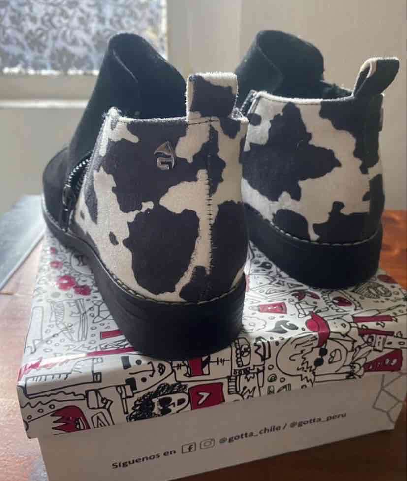 Botines negros con estampado vaca - miniatura 2