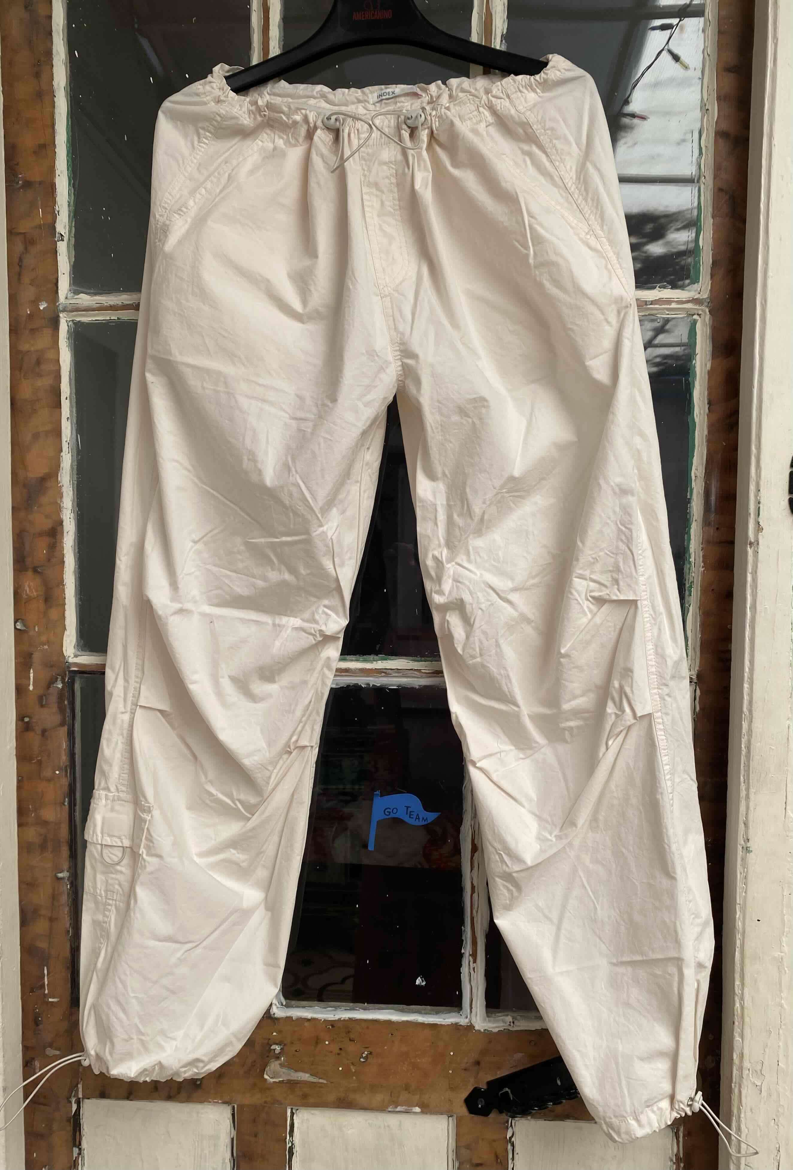 Pantalón blanco con ajuste elástico - 1