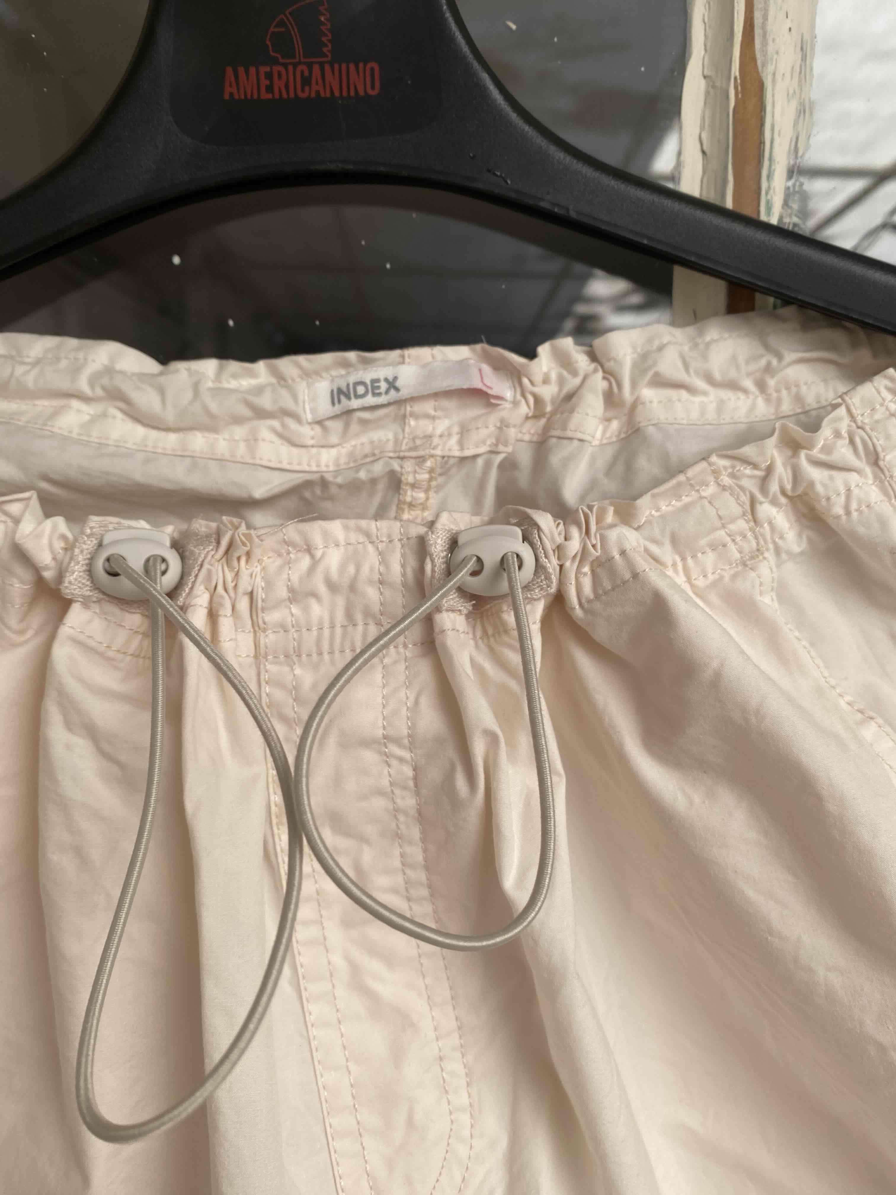 Pantalón blanco con ajuste elástico - 4