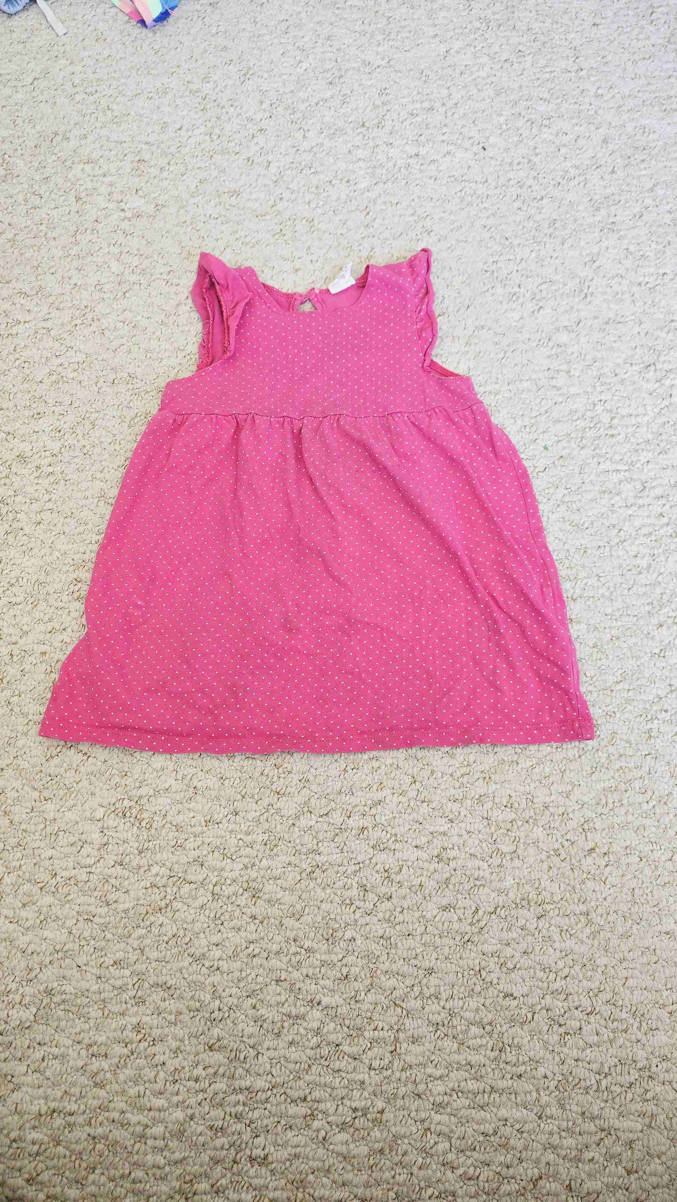 Vestido rosa de lunares. H&M