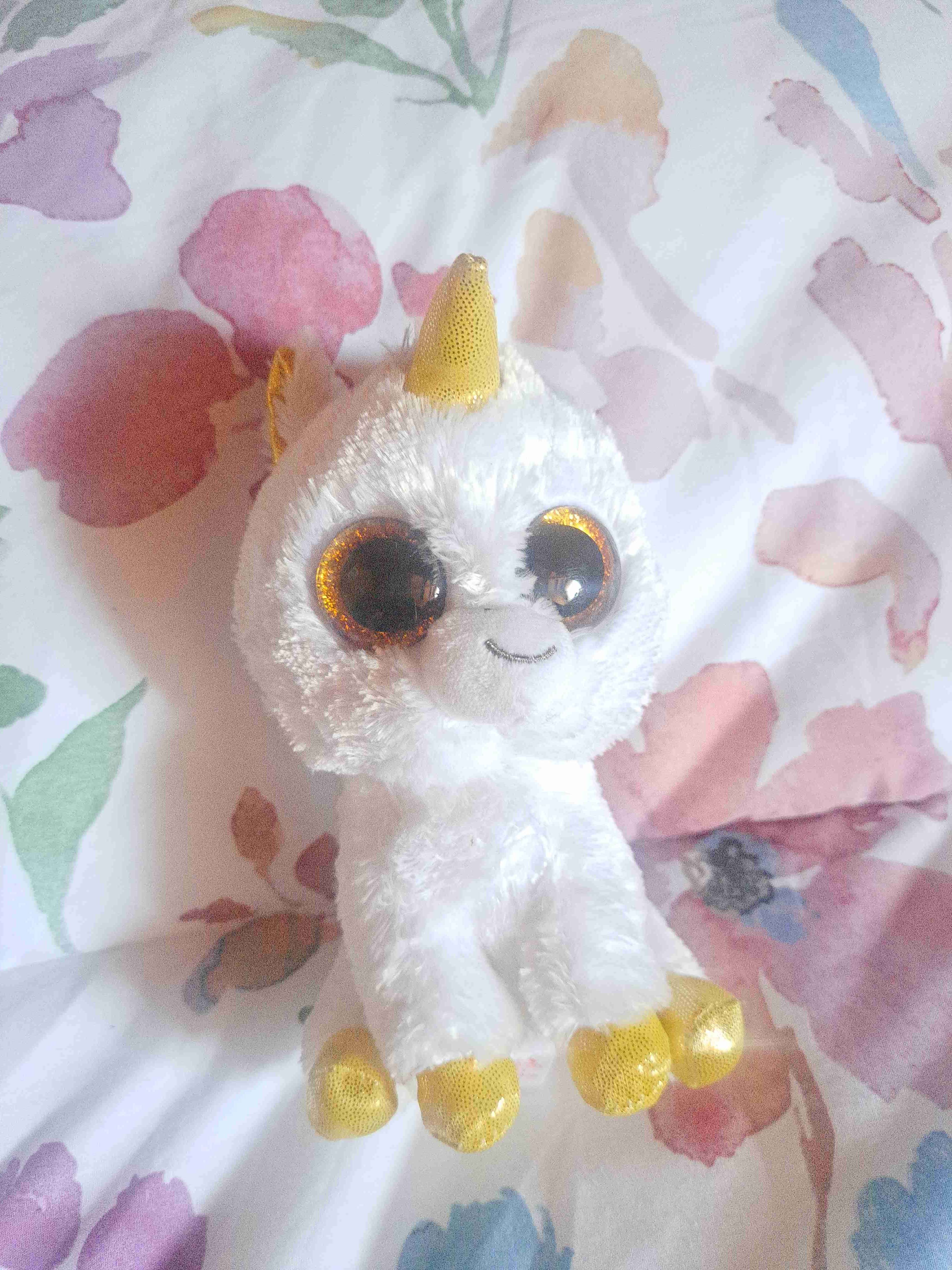 Peluche unicornio blanco con dorado