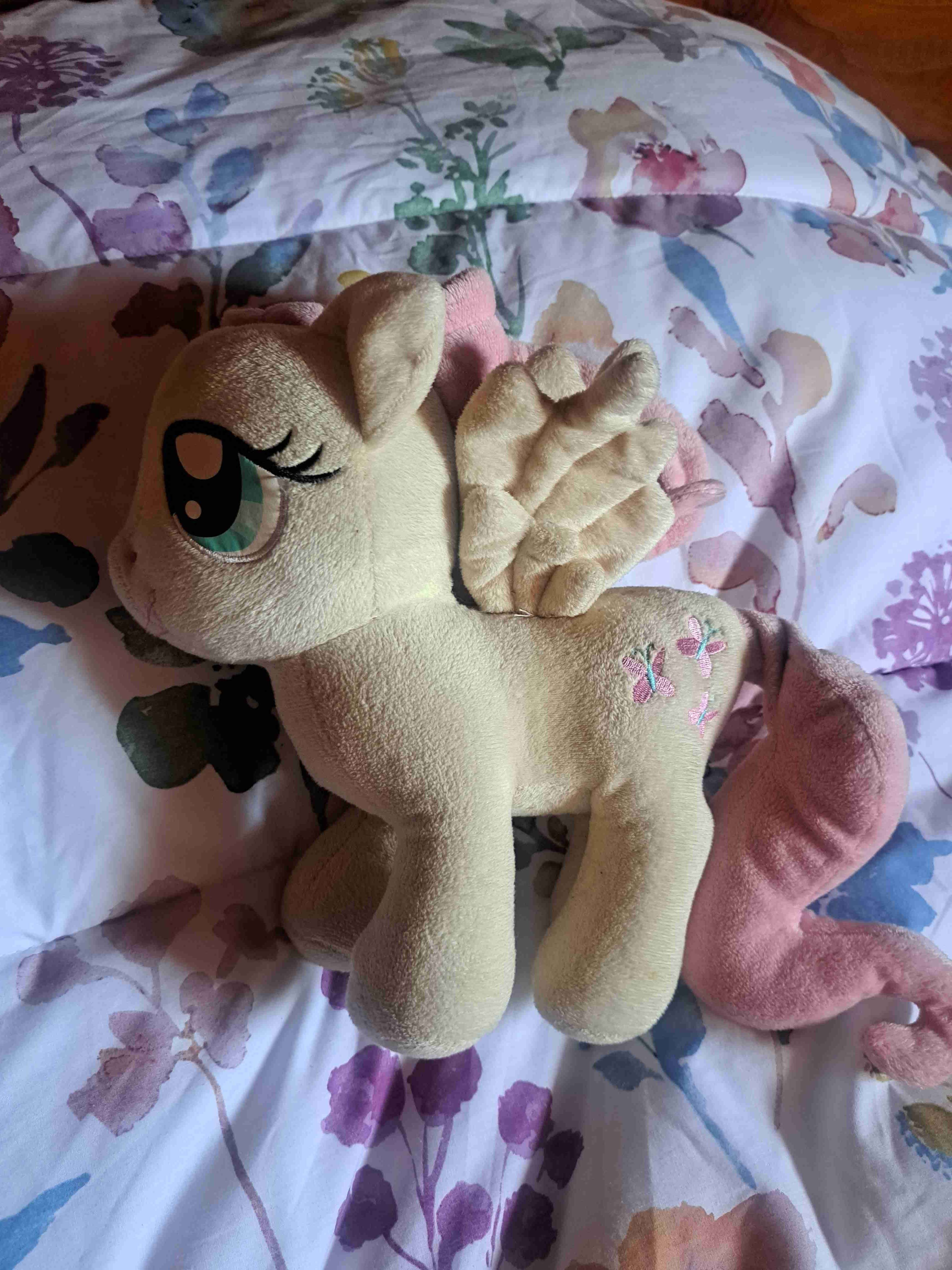 Peluche pony color beige y rosado