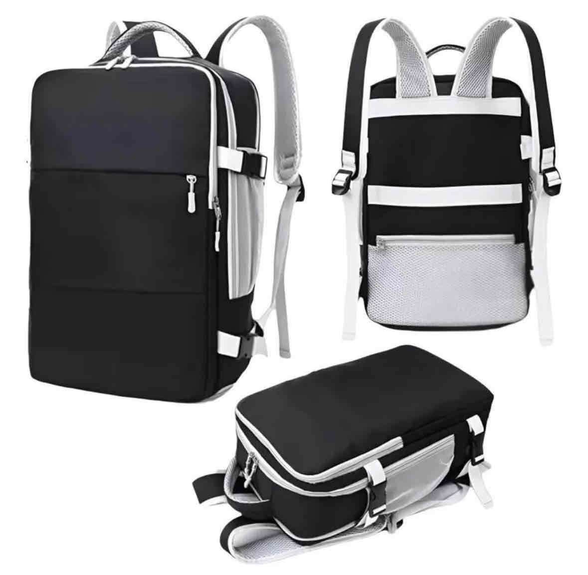 Mochila negra viajera - miniatura 1