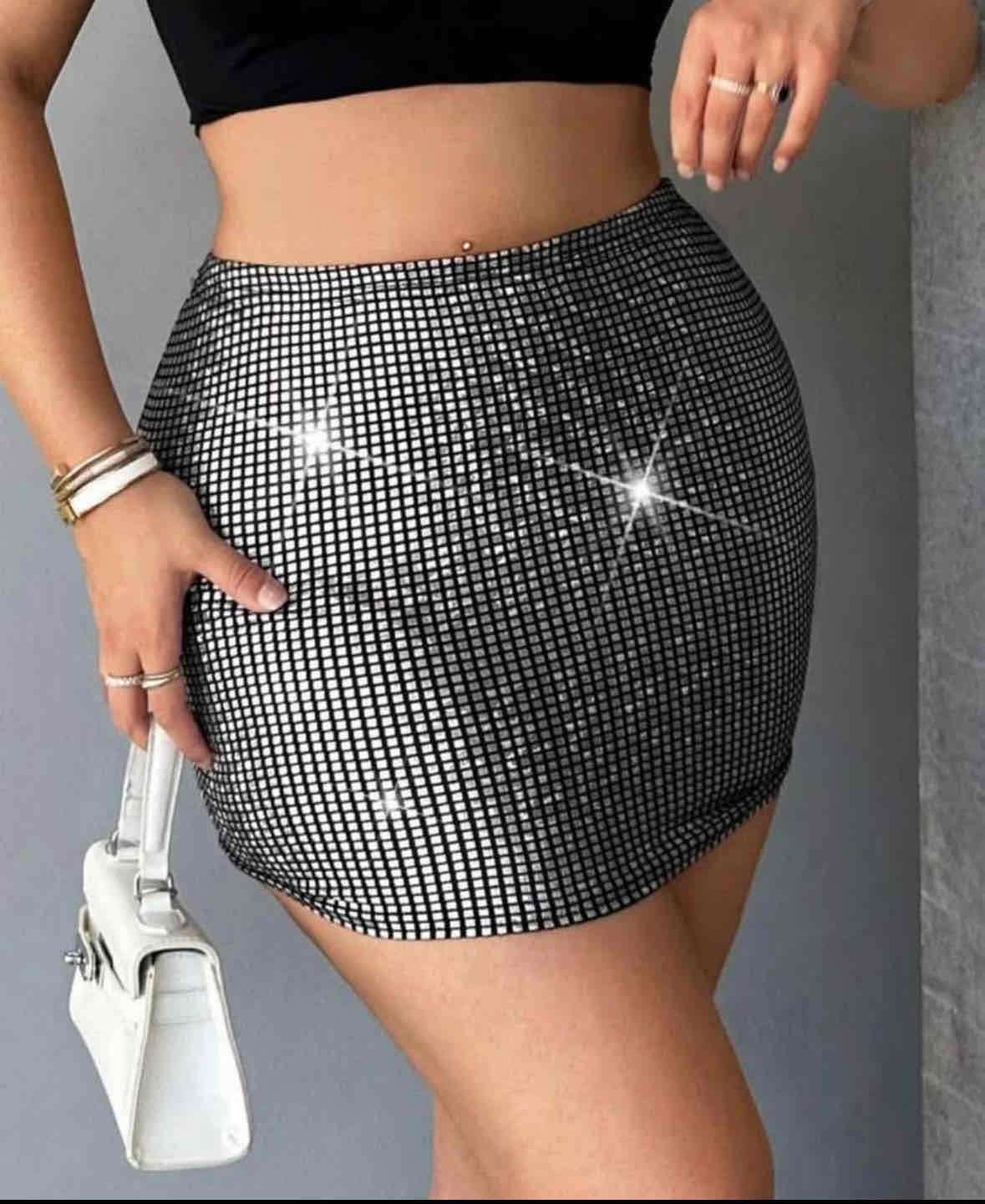 Falda corta con brillo - miniatura 2