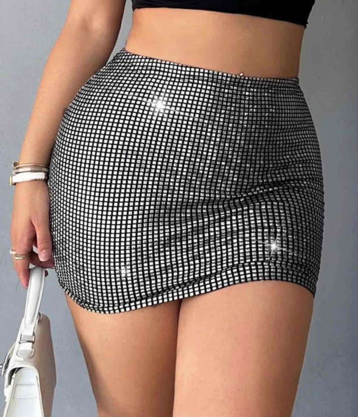 Falda corta con brillo - miniatura 3