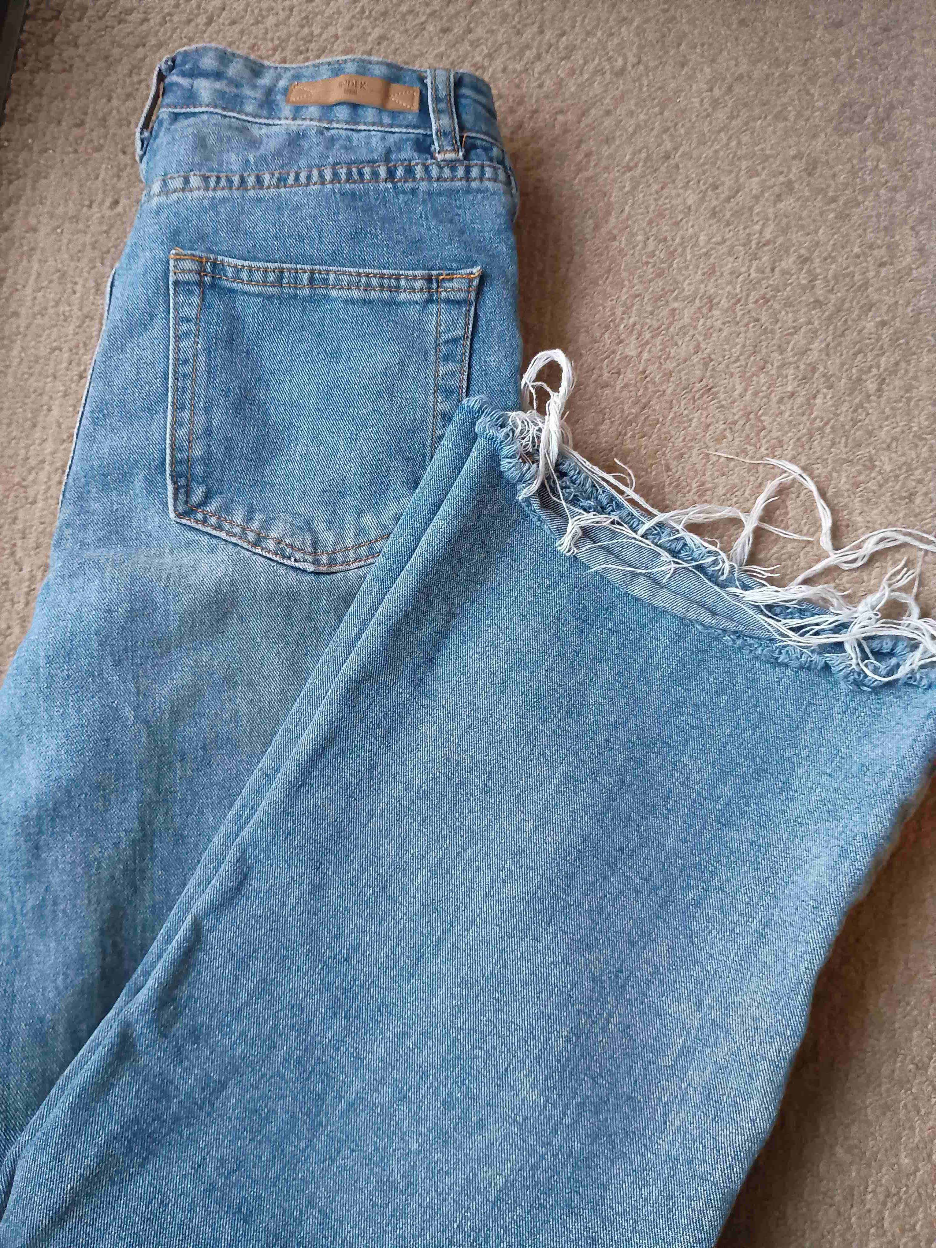 Jeans claros desgastados - miniatura 1