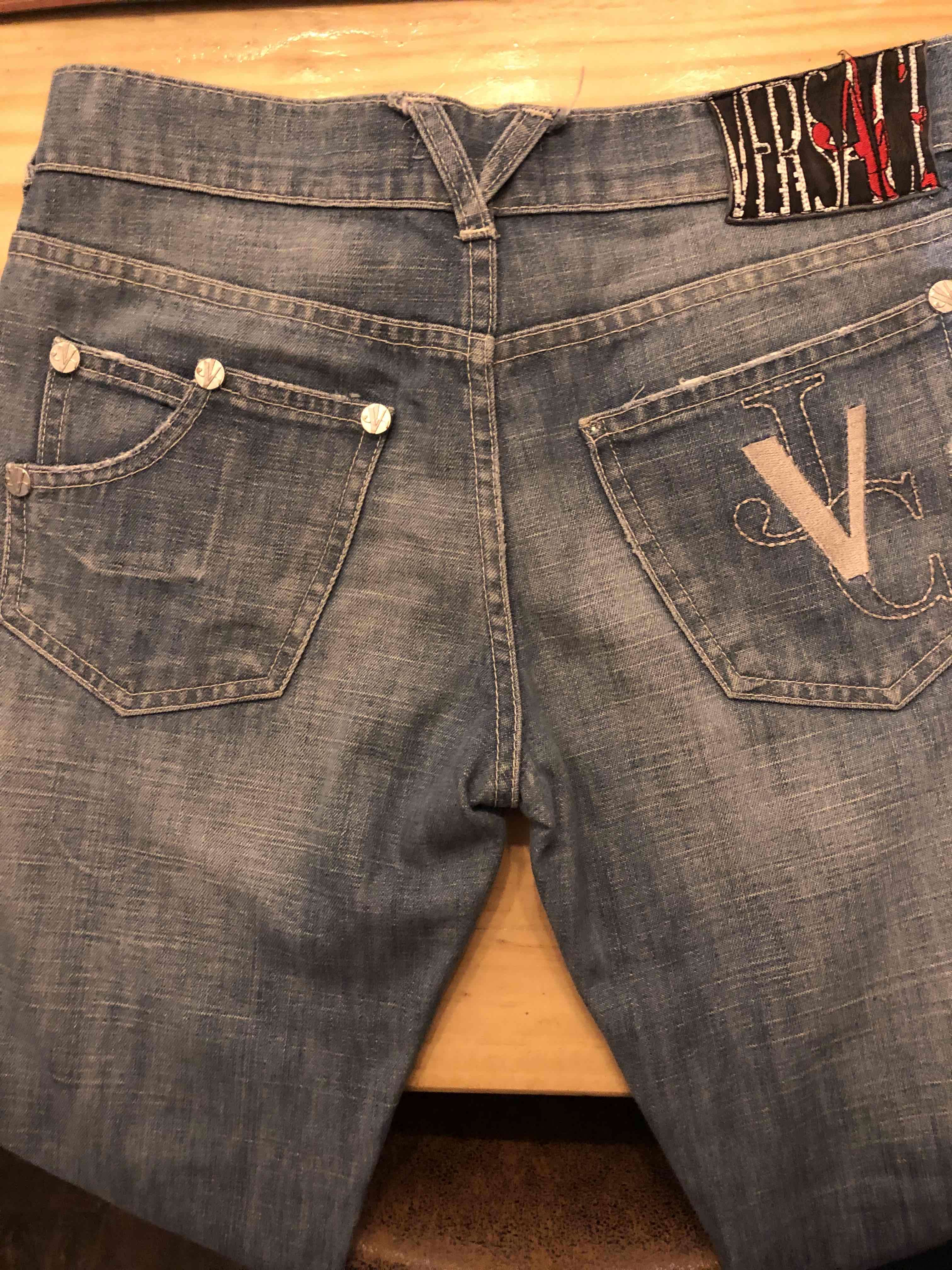 Jeans Versace Couture con logo bordado - miniatura 2