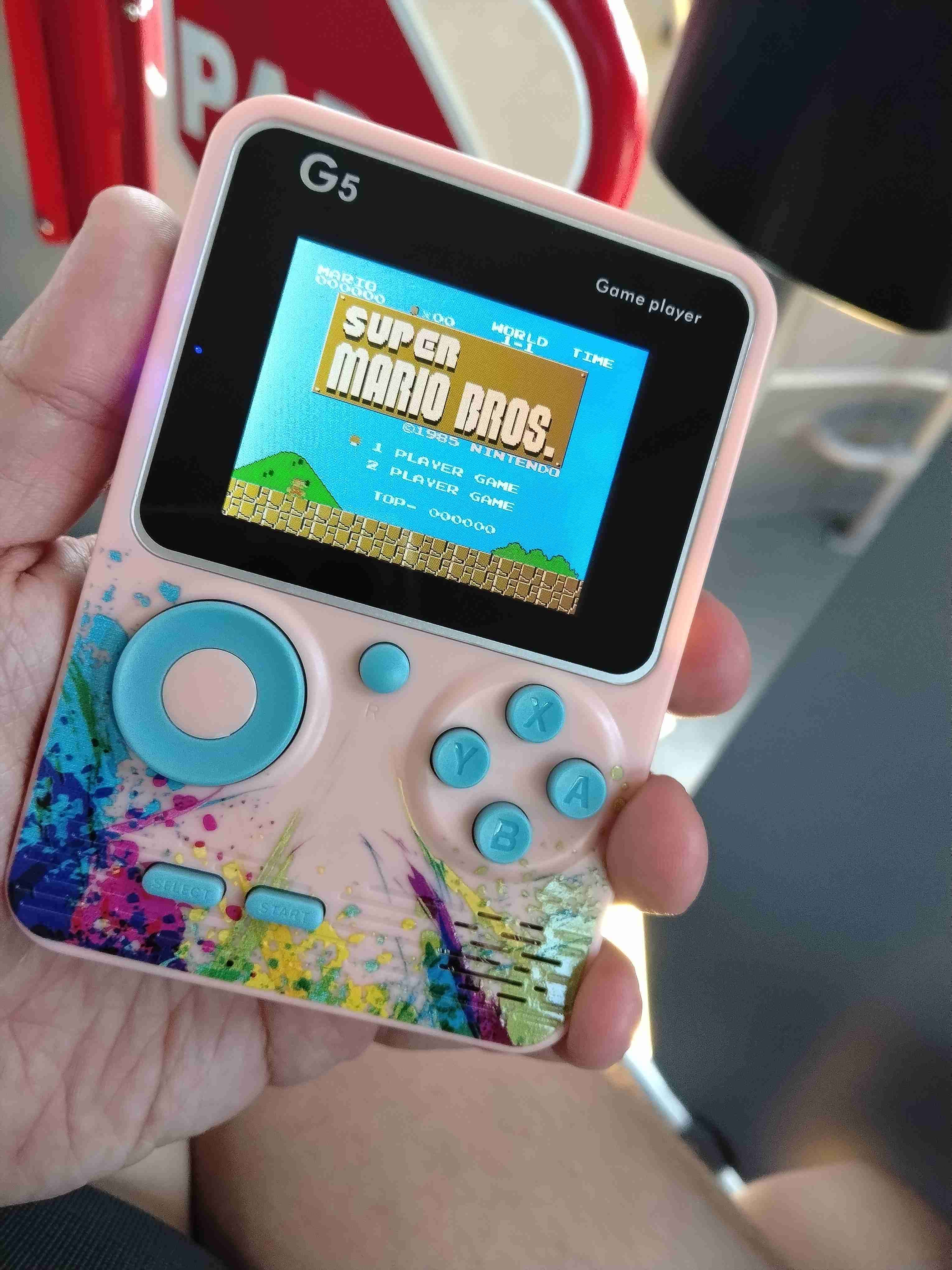 Consola portátil G5 rosa NES 500 juegos retros - miniatura 1