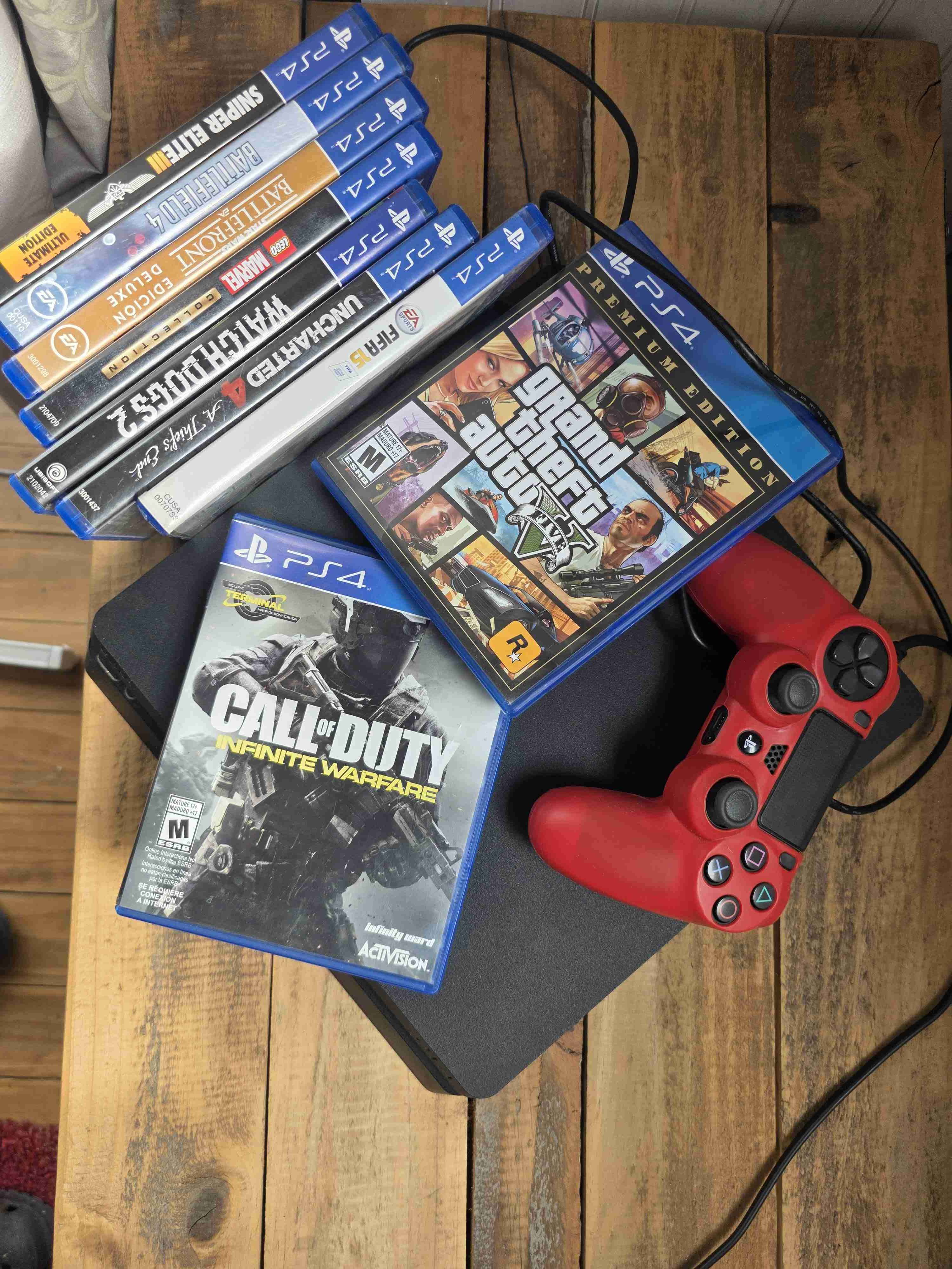 Consola PS4 con juegos y mando - miniatura 1