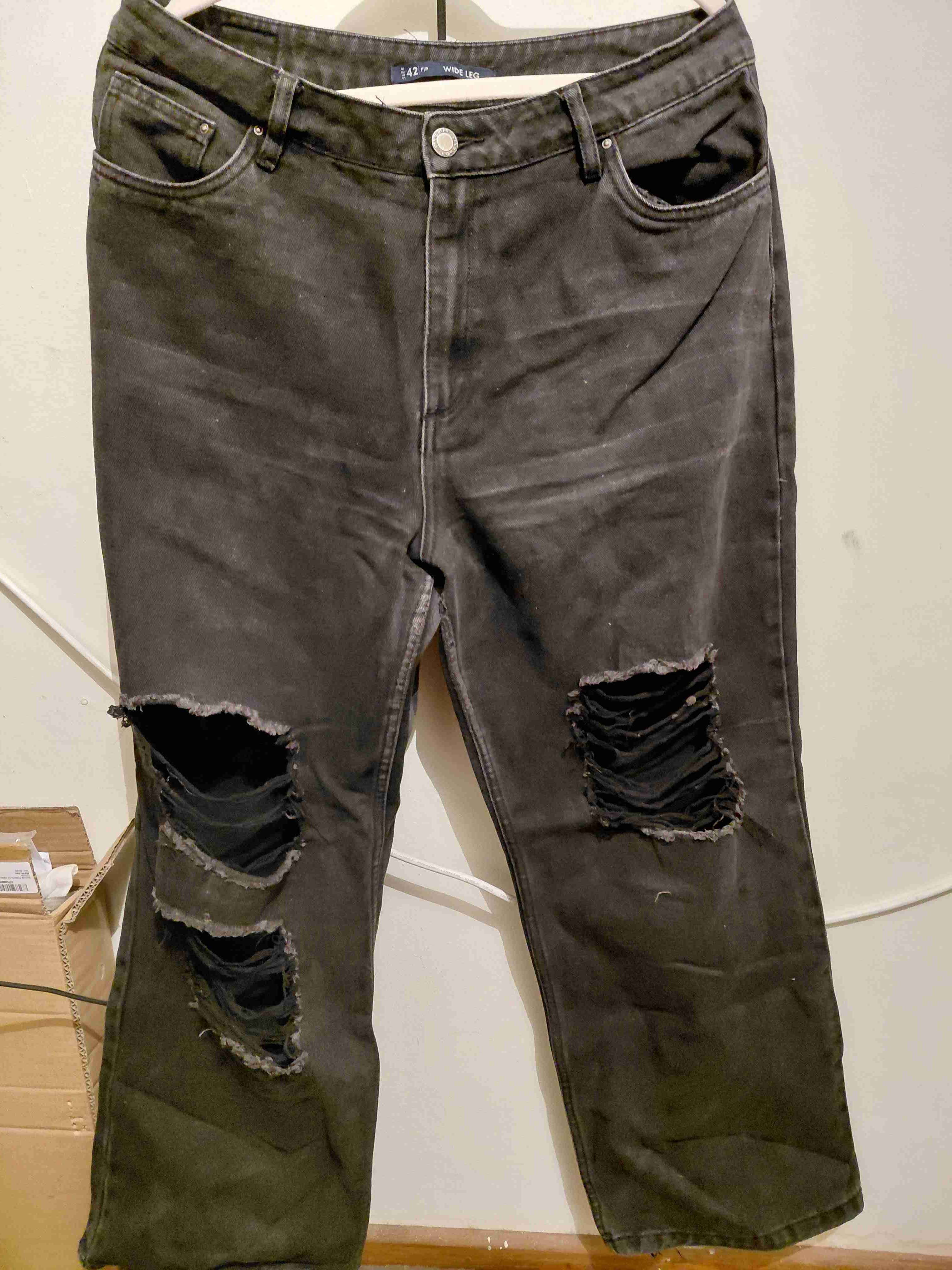 Jeans negros desgastados