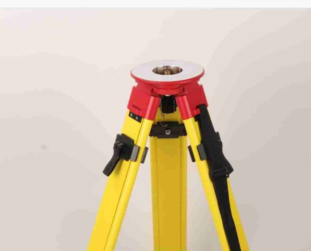 Trípode amarillo para topografía - miniatura 1