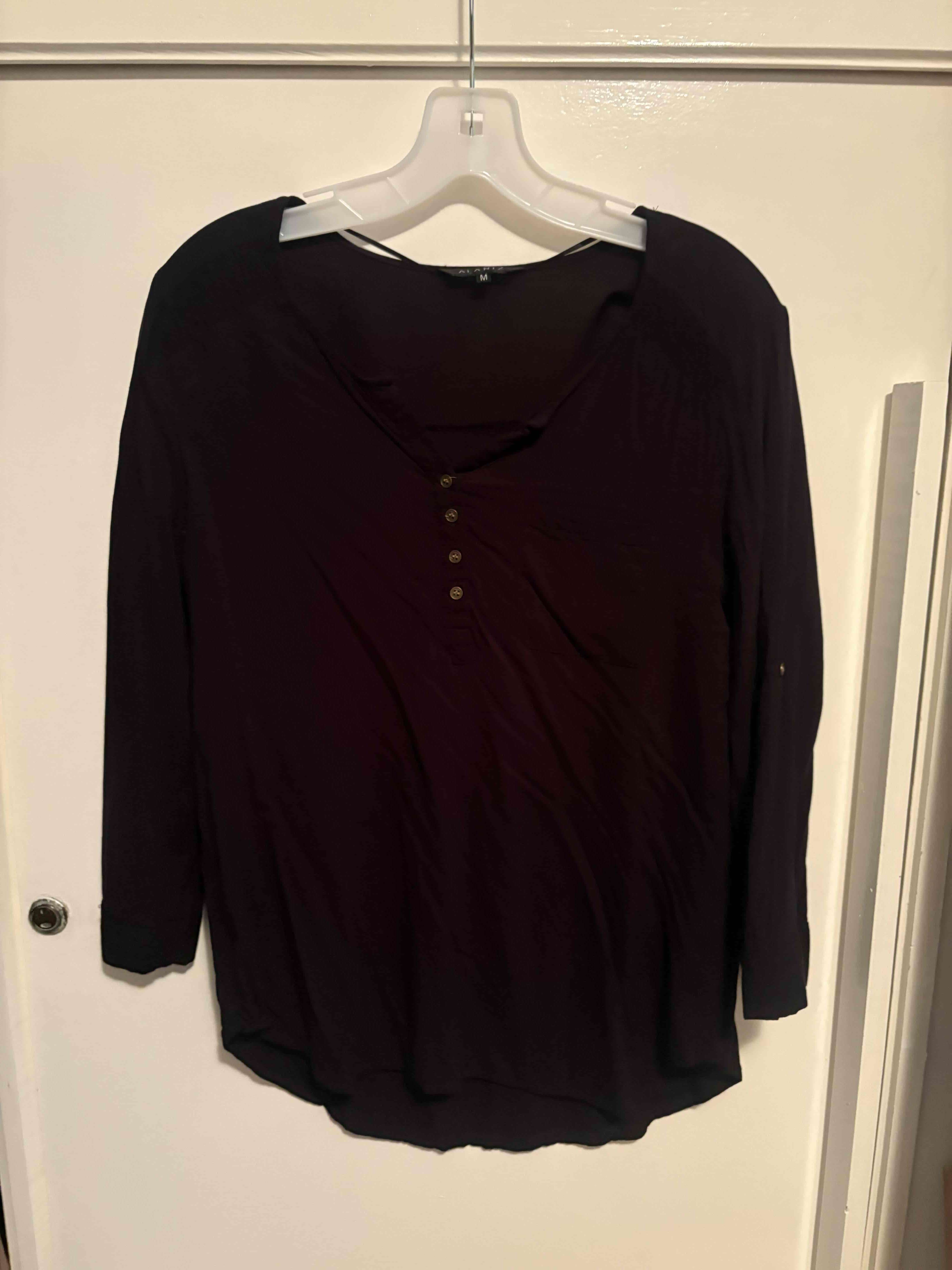 Blusa negra de manga larga