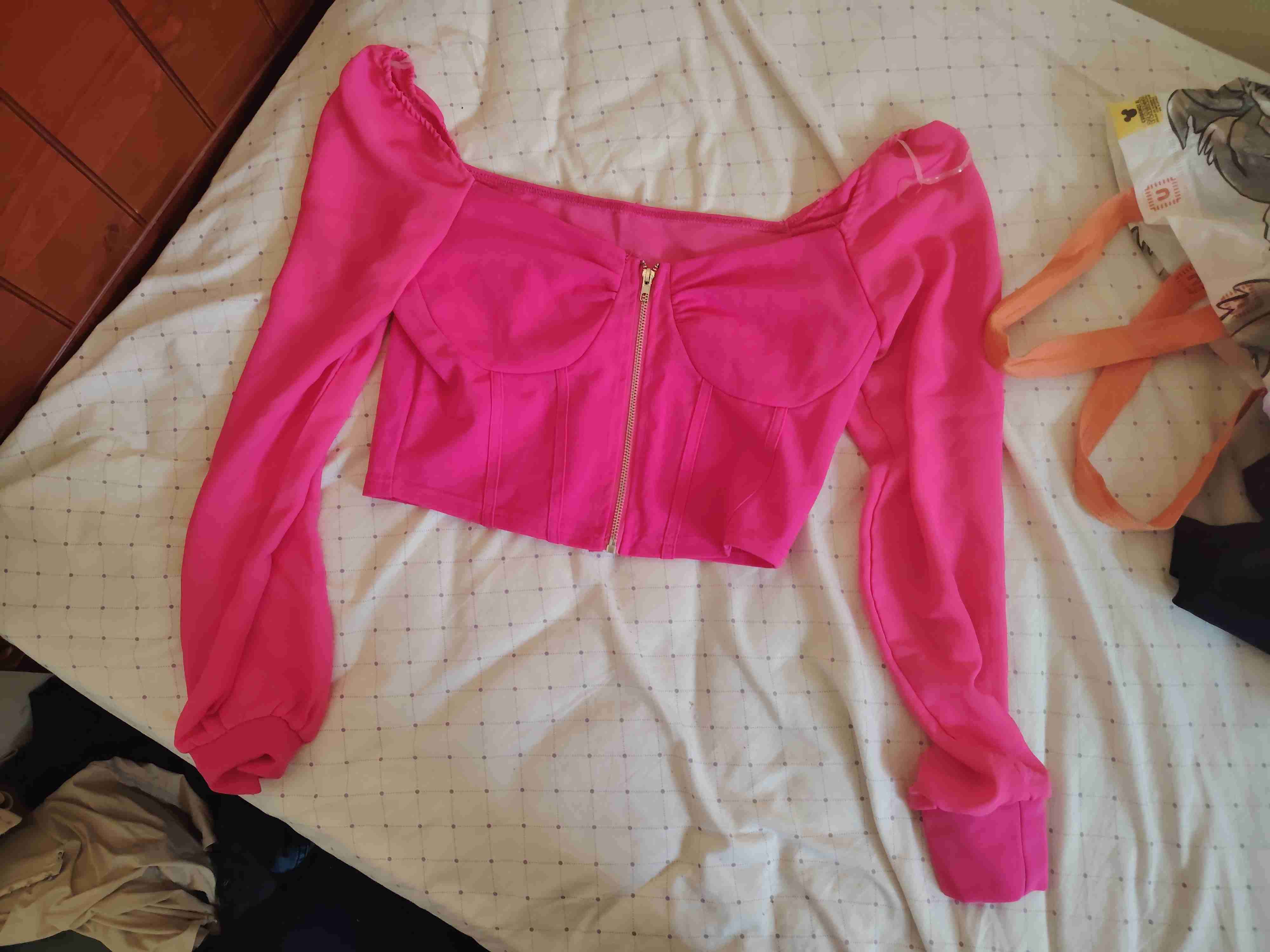 Top rosa con mangas largas