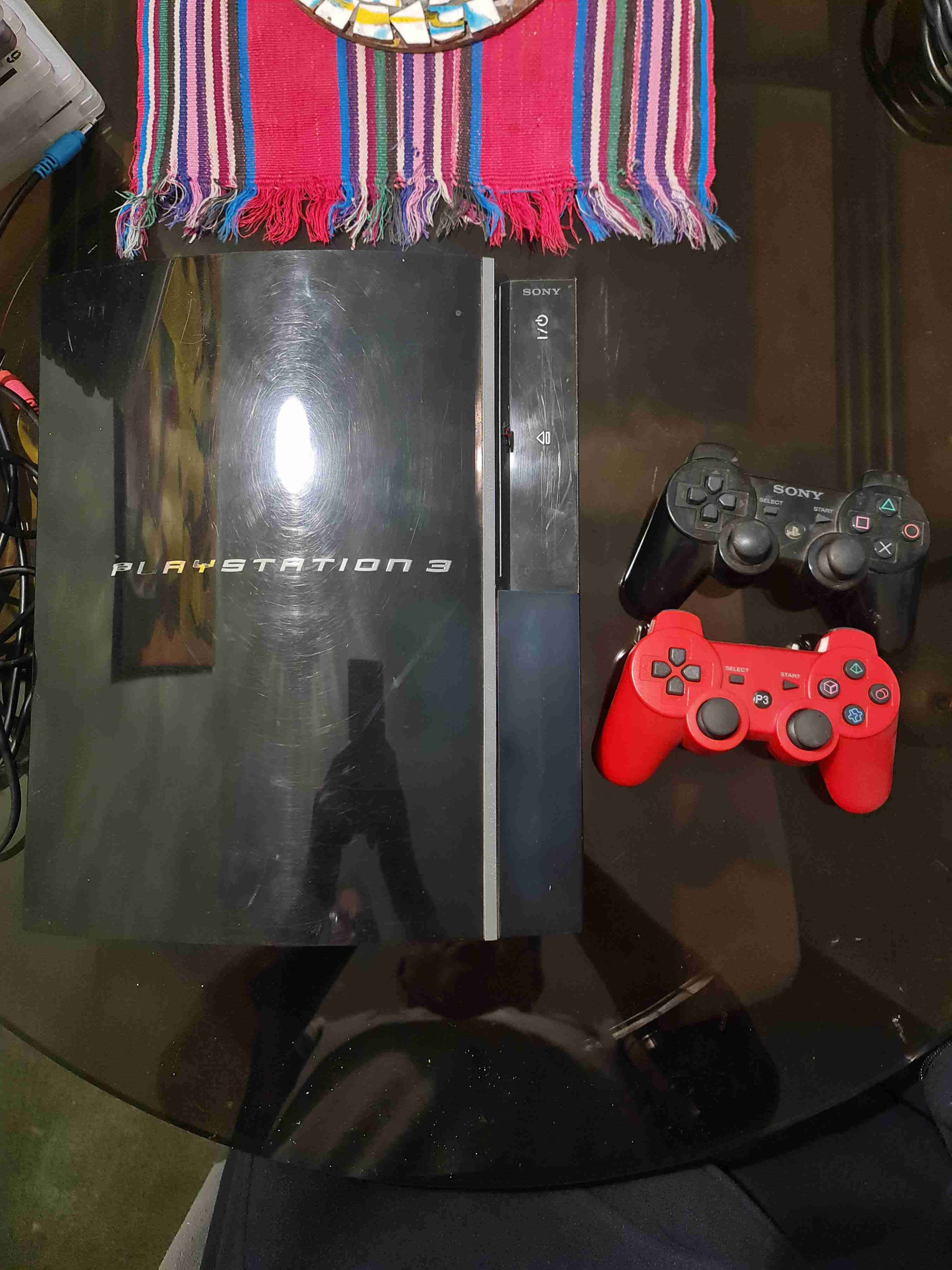 Consola PlayStation 3 con dos controles - 1