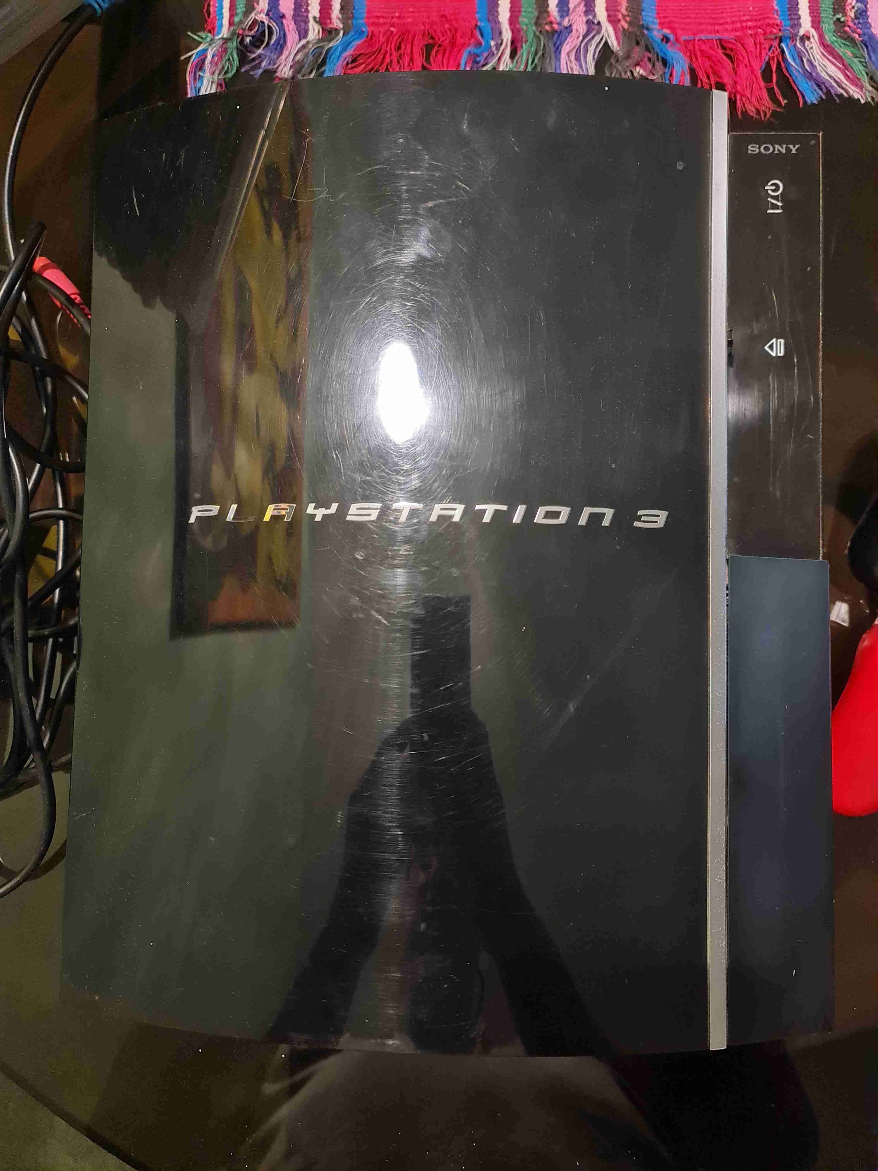 Consola PlayStation 3 con dos controles - 4