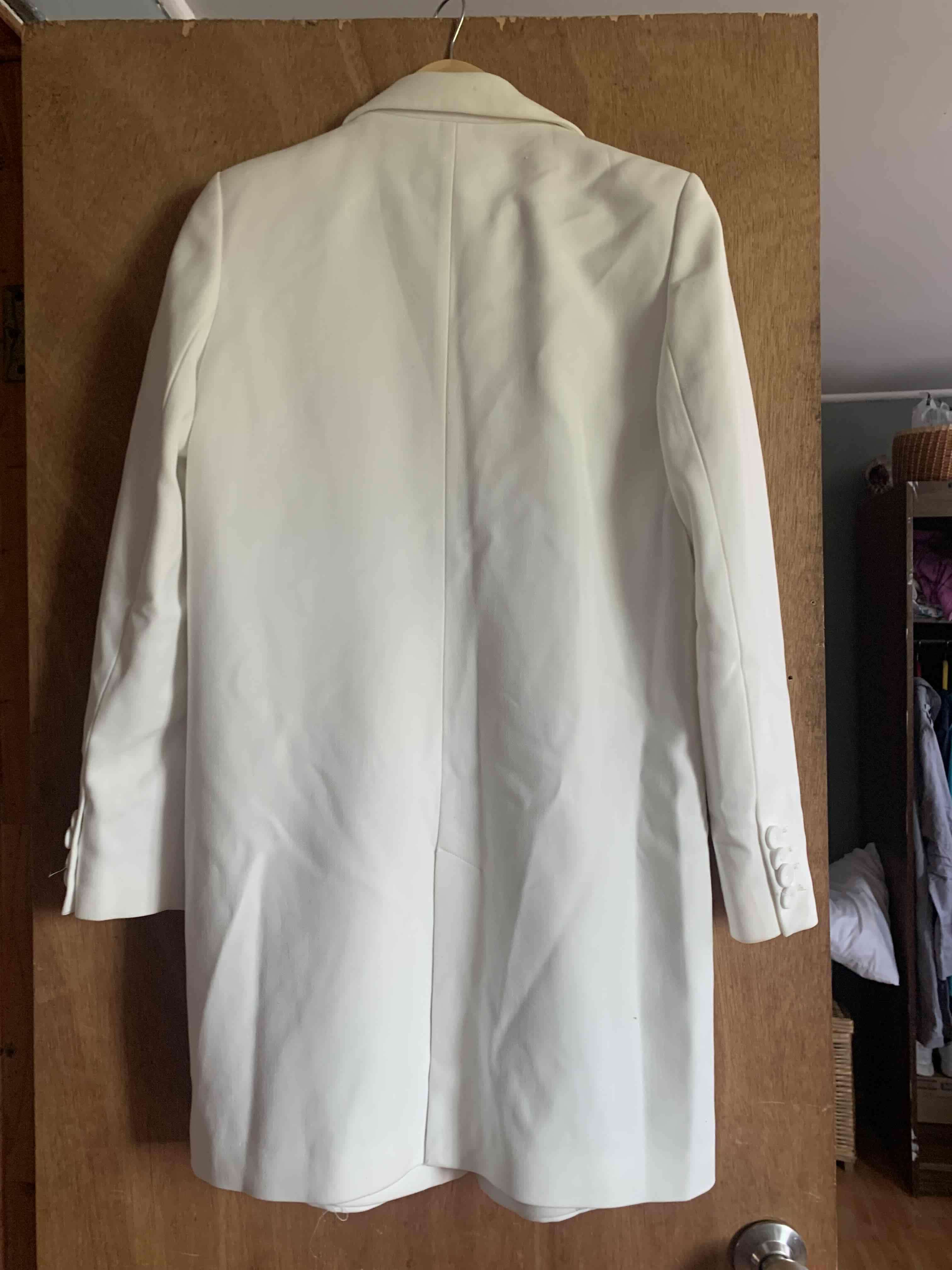 Abrigo blanco elegante - miniatura 1