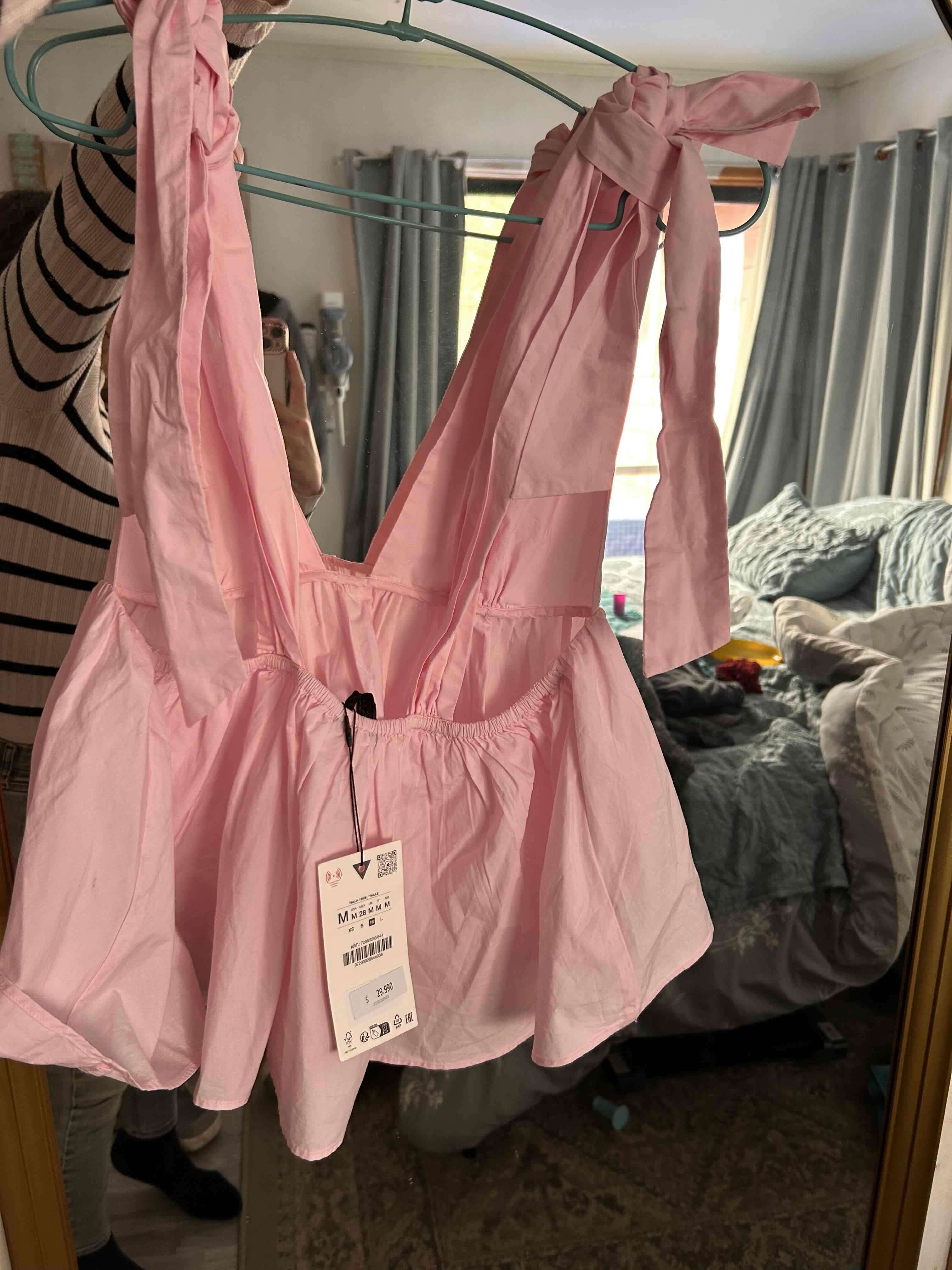 Blusa rosa con tirantes - miniatura 2