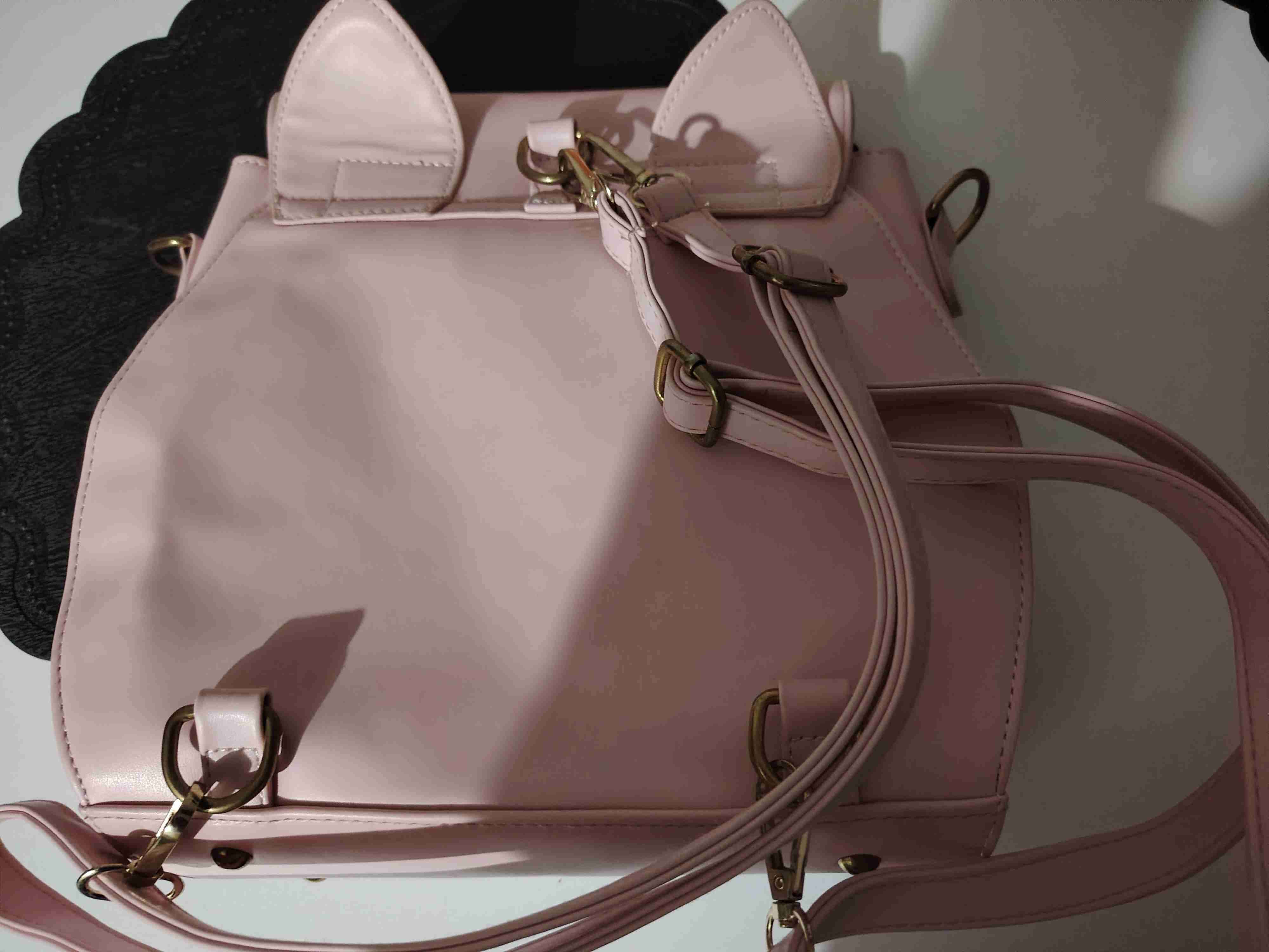 Mochila rosada con detalle dorado - miniatura 2