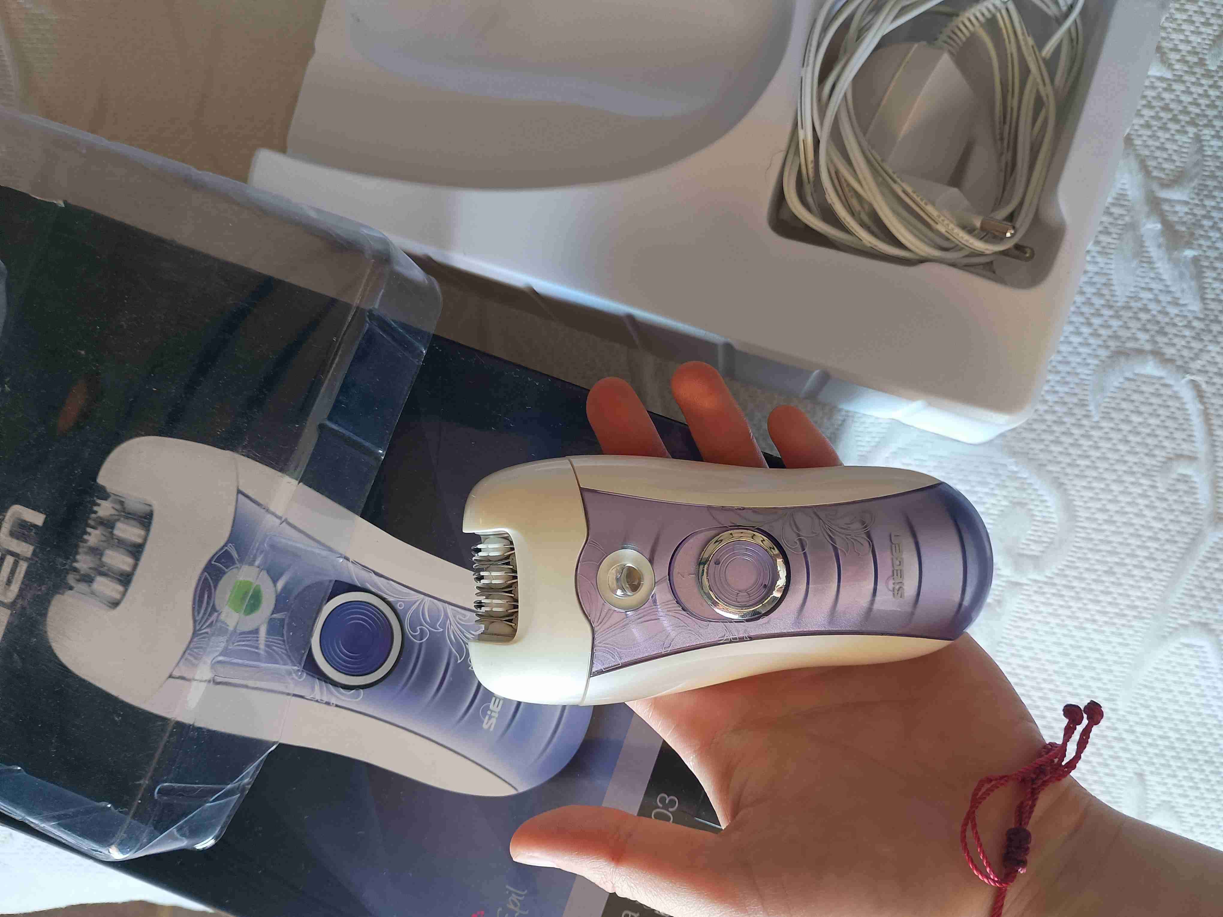 Depiladora eléctrica blanca y morada - miniatura 2